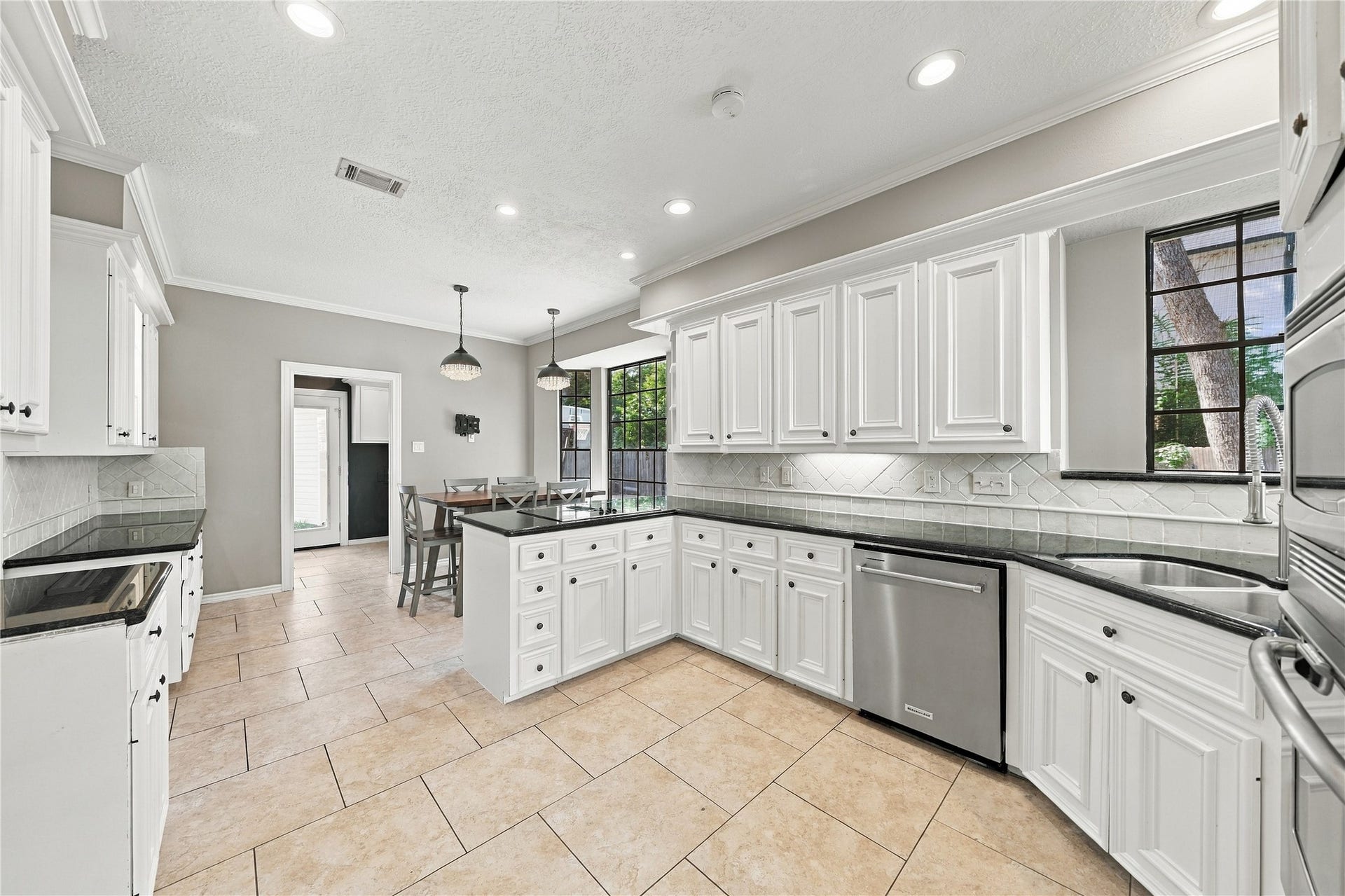 Real hardwood cabinets, stainless appliances