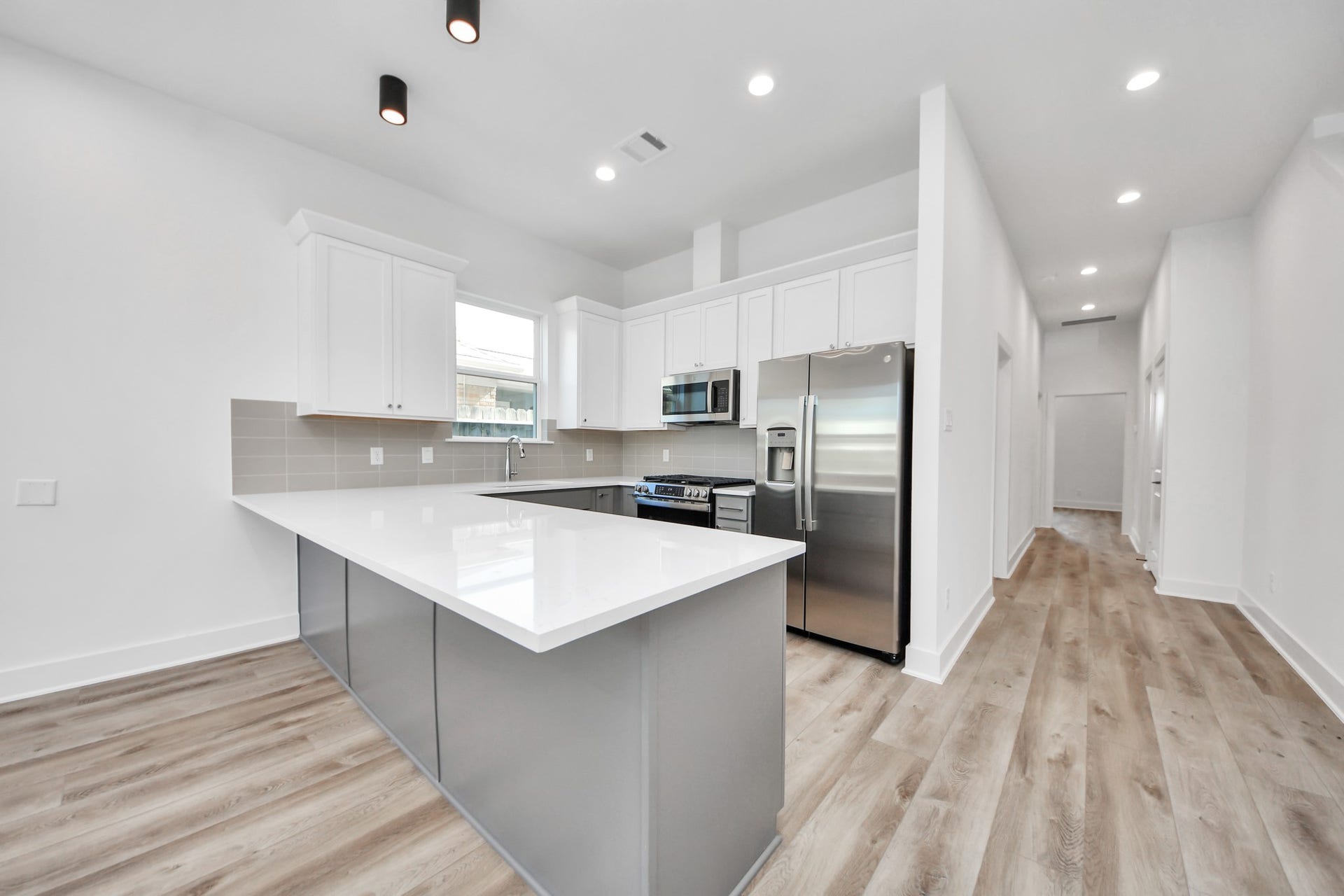 2904 Ruth Street, Houston, TX 77004 Unit B kitchen with a spacious island and quartz countertops.