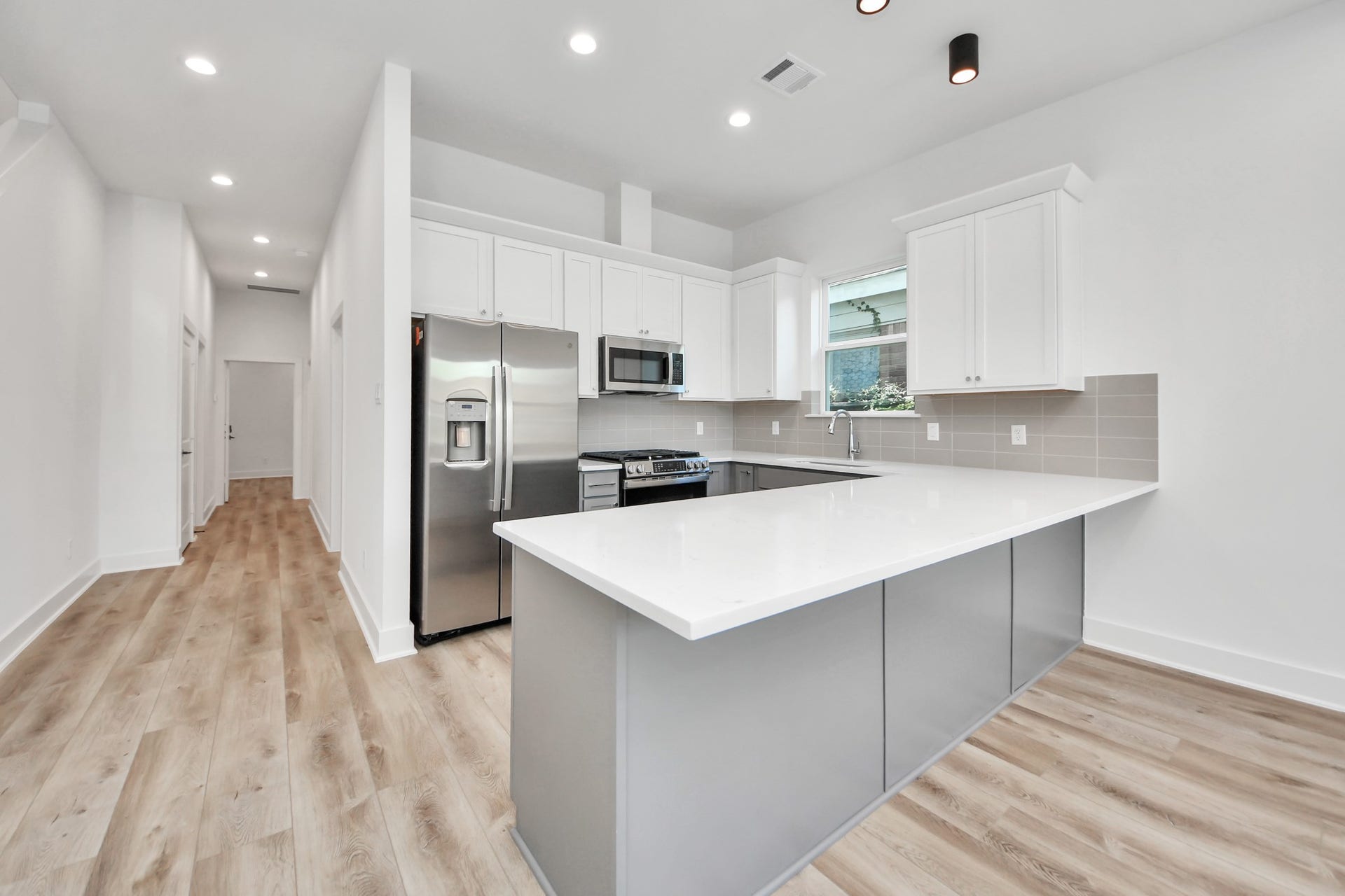 2904 Ruth Street, Houston, TX 77004 Unit A kitchen with a spacious island and quartz countertops.