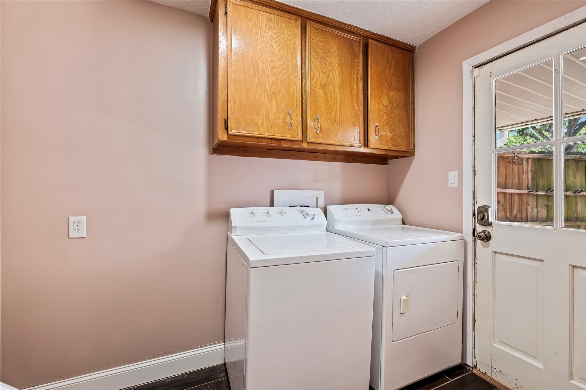 501 Audubon Street, League City, TX 77573 Utility room in house with space for additional refrigerator and built in cabinets.