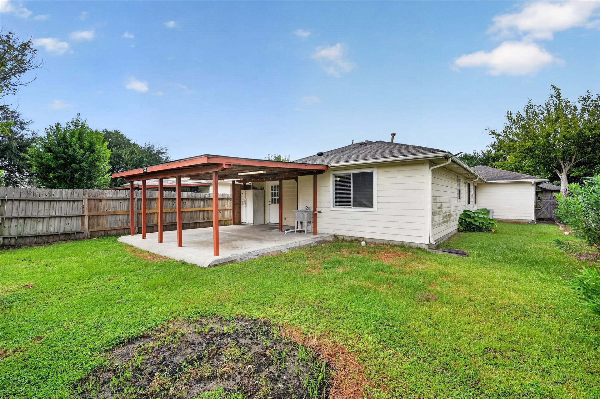 Spacious backyard with a covered
patio
