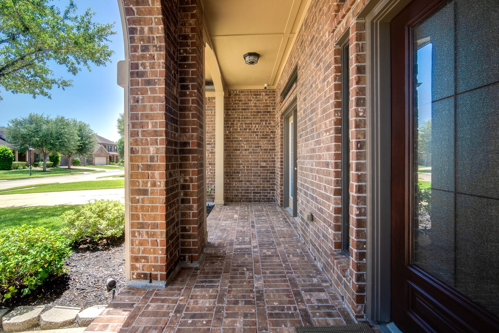 3006 Southern Mill Court, Pearland, TX 77584 Covered front porch to welcome your family and guests