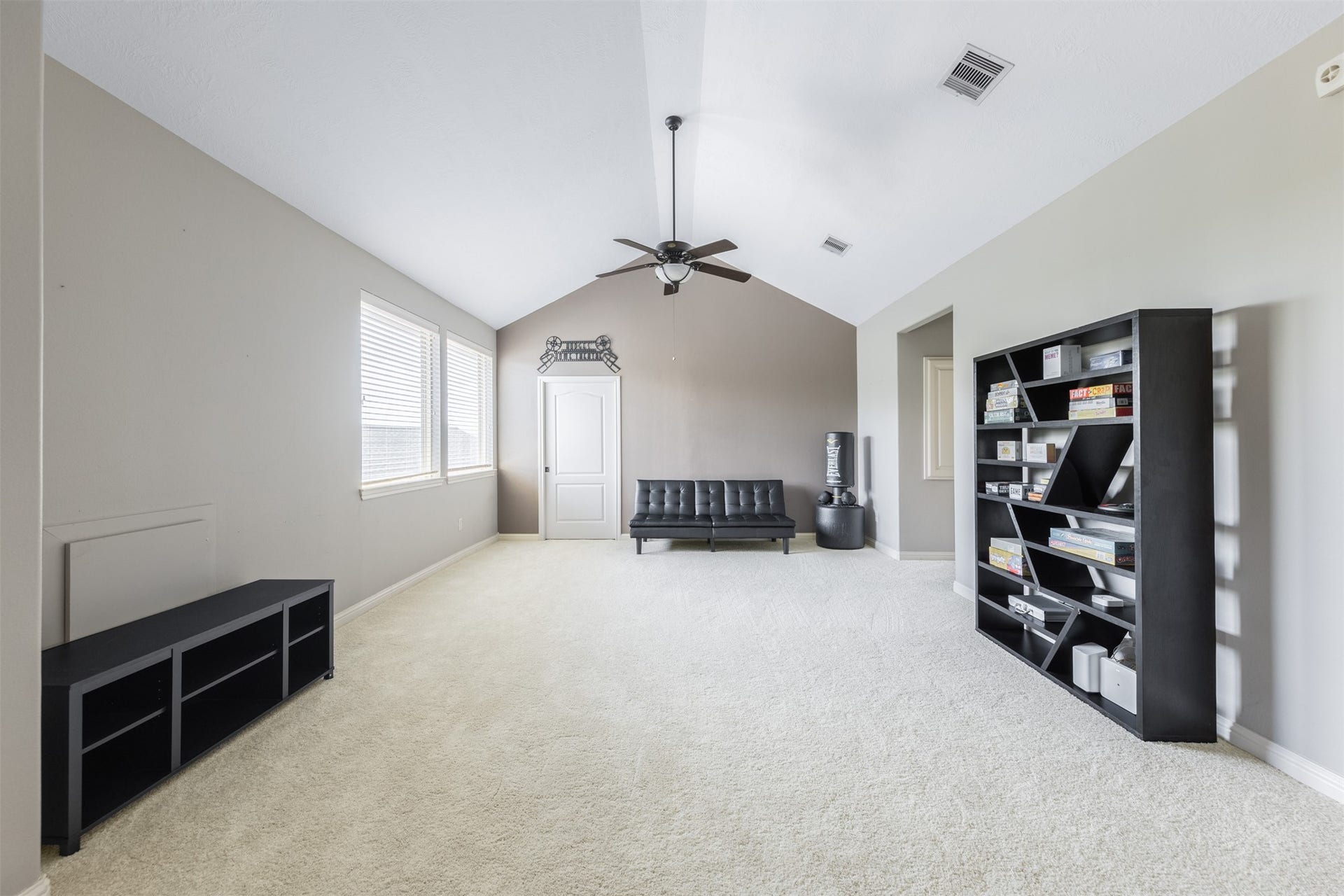 5835 Caspian Falls Lane, Fulshear, TX 77441 The oversized game room offers endless possibilities for recreation, hobbies, a study zone or additional living space. Vaulted ceilings and abundant natural light make this versatile room feel open, bright and inviting.