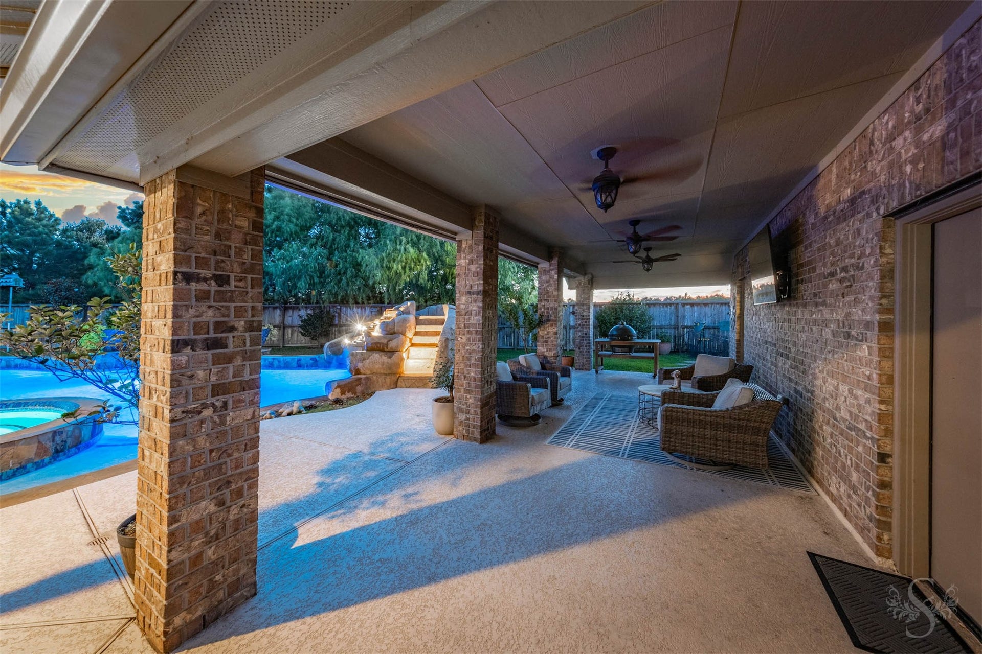 5835 Caspian Falls Lane, Fulshear, TX 77441 Designed for entertaining, this incredible outdoor retreat features two covered patios, surround sound wiring and audio systems inside and out. From quiet evenings under the stars to large gatherings with friends and family, this backyard was built to impress.