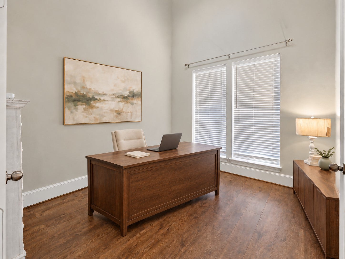 6714 Wellbrook Falls Lane, Katy, TX 77493 Home office features wood flooring, tall ceilings, and natural light. (virtually staged)