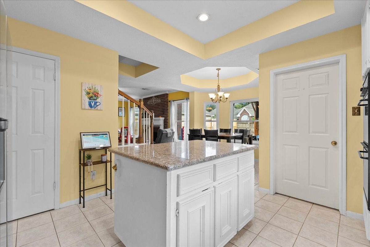 1908 Summer Reef Drive, League City, TX 77573 Pantry to the left and laundry room straight back.
