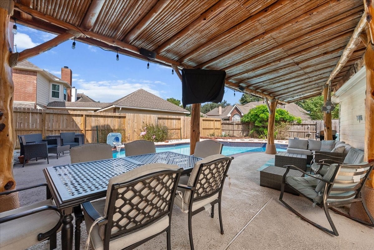 1908 Summer Reef Drive, League City, TX 77573 Now that's a palapa! Look forward to enjoying evenings back here!