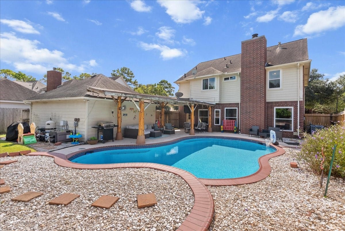 1908 Summer Reef Drive, League City, TX 77573 Back view of the home.