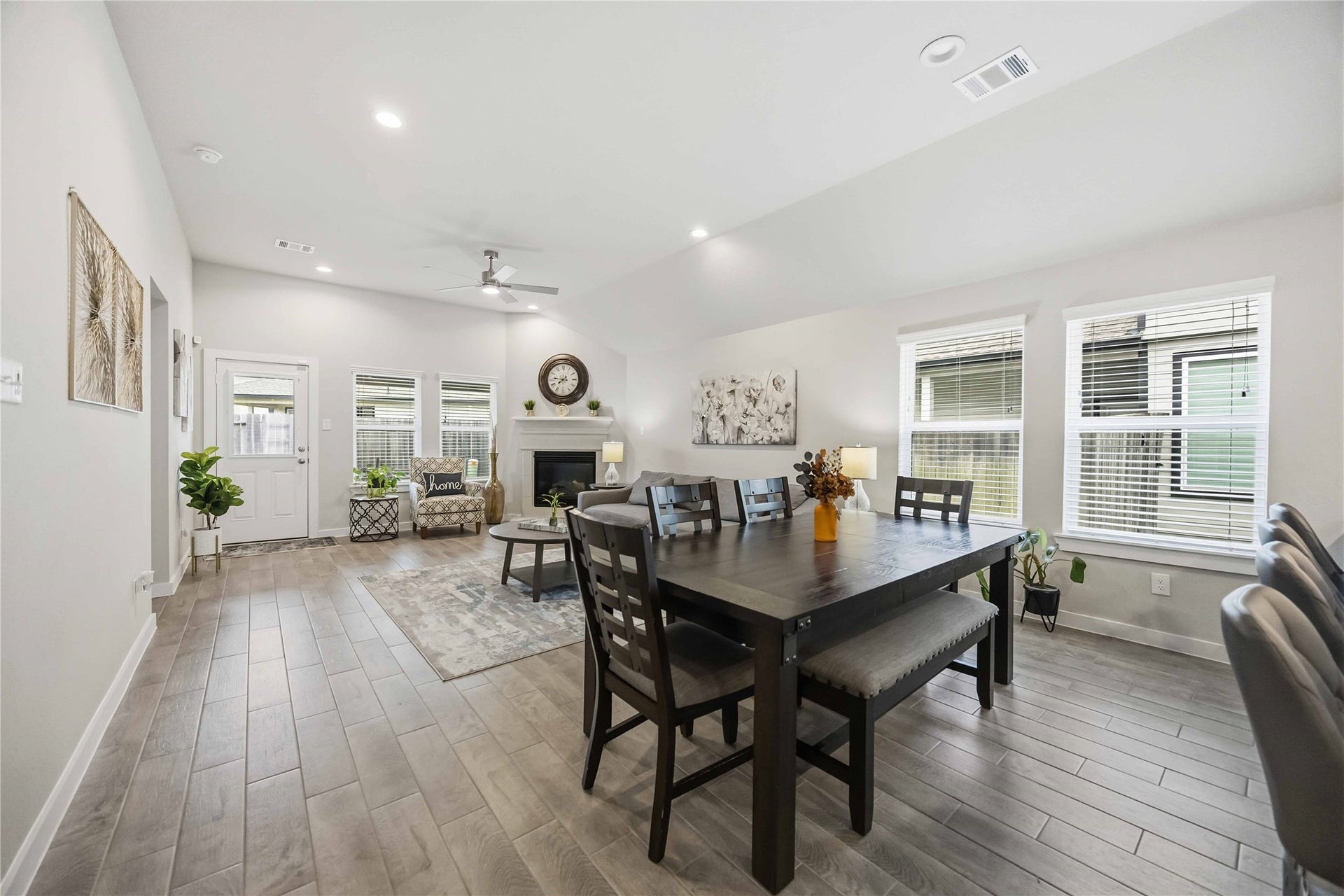 615 Orchard Vale Road, Rosharon, TX 77583 Stay connected to every moment with an open-concept design that seamlessly flows from the kitchen into the dining and living areas.