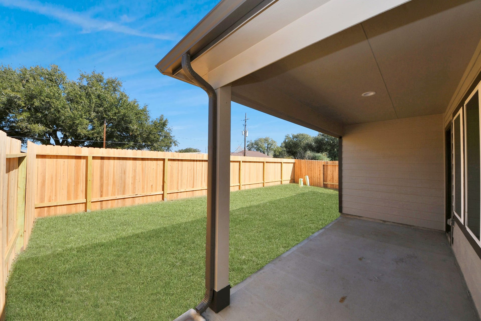 11023 Hosta Stream Drive, Houston, TX 77044 Experience outdoor living at its finest on this expansive covered patio, thoughtfully designed for BBQs and delightful outdoor dining. Sample photo of completed home with similar floor plan. Actual colors and selections may vary.