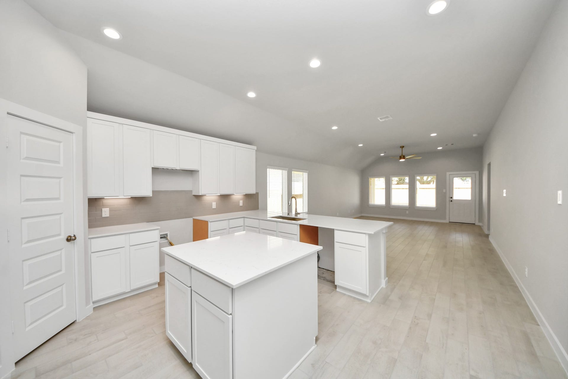 11023 Hosta Stream Drive, Houston, TX 77044 The extended counter area adds both practicality and style, making meal preparation a breeze. Every detail is thoughtfully designed to enhance the kitchen's functionality and aesthetic appeal. Sample photo of completed home with similar floor plan. Actual colors and selections may vary.