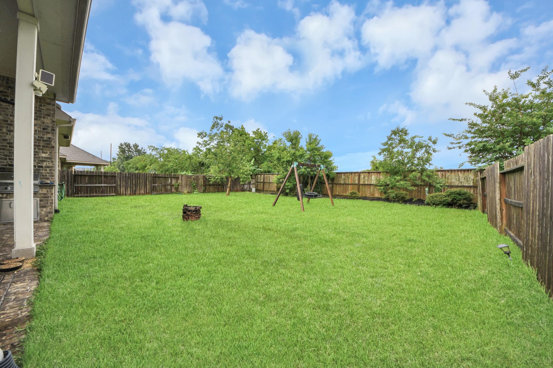 Large backyard perfect for outdoor living.