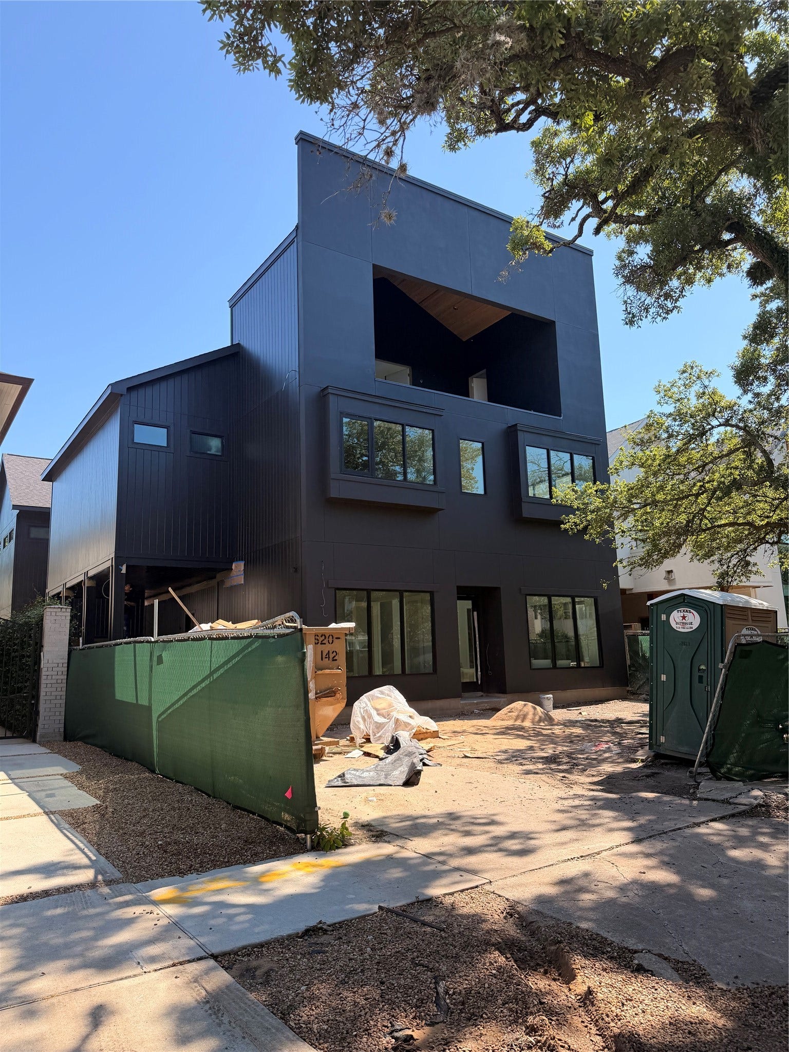 1523 Marshall Street, Houston, TX 77006 Elevated front with third level game room and theater room and glass enclosed terrace