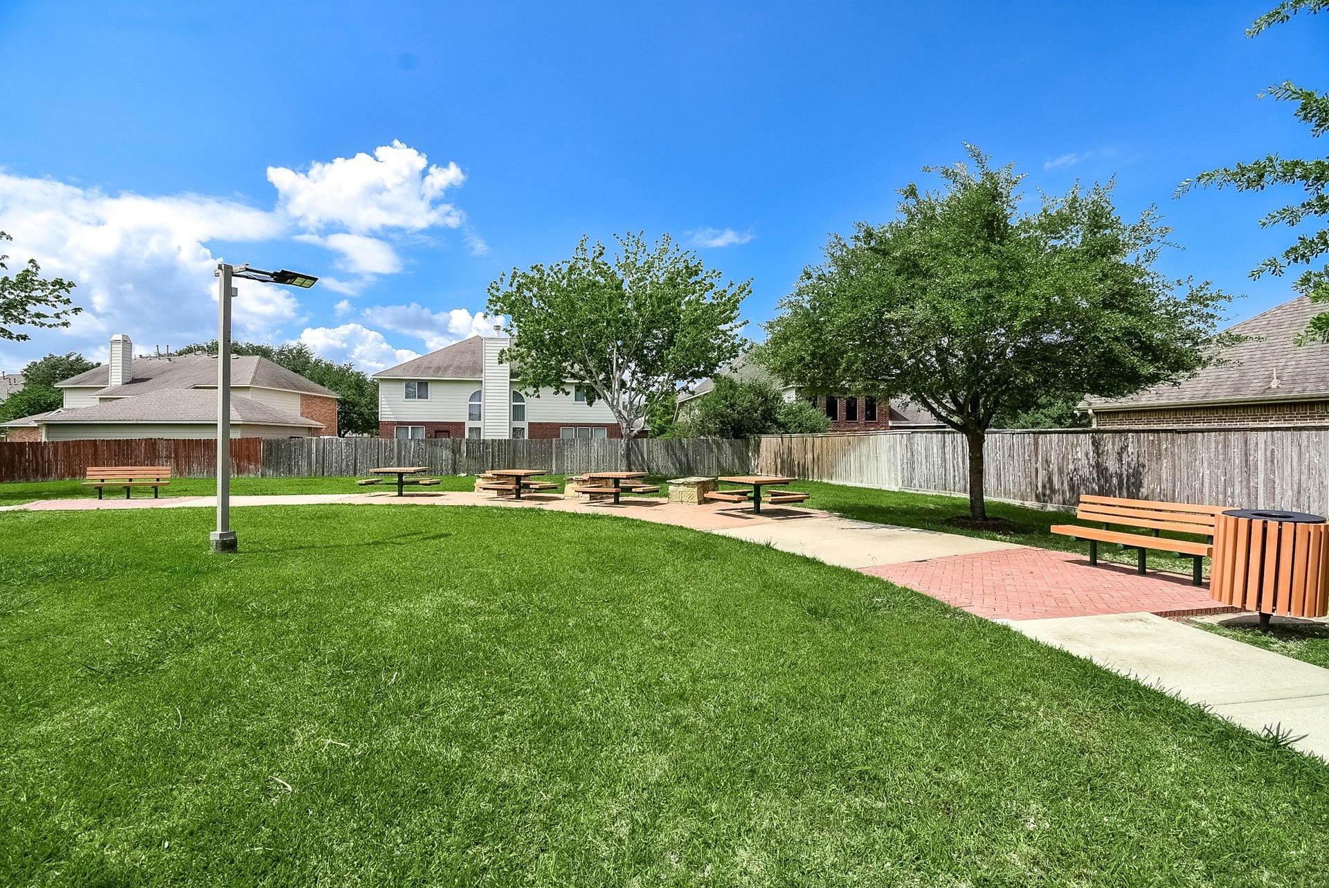 Located just steps from one of the small pocket neighborhood parks.  Perfect place to let your kids run & play with their friends while you can still keep a close watch on them.