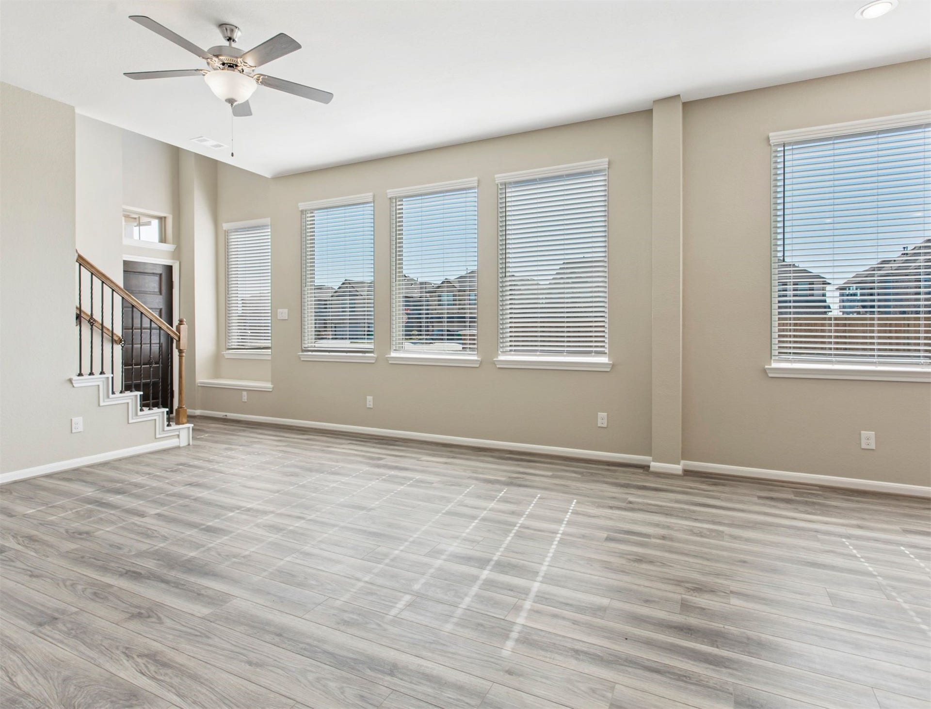 2511 Bordelon Lane, Missouri City, TX 77459 Immense and bright space in this open concept living room with large windows offering tons of natural light!