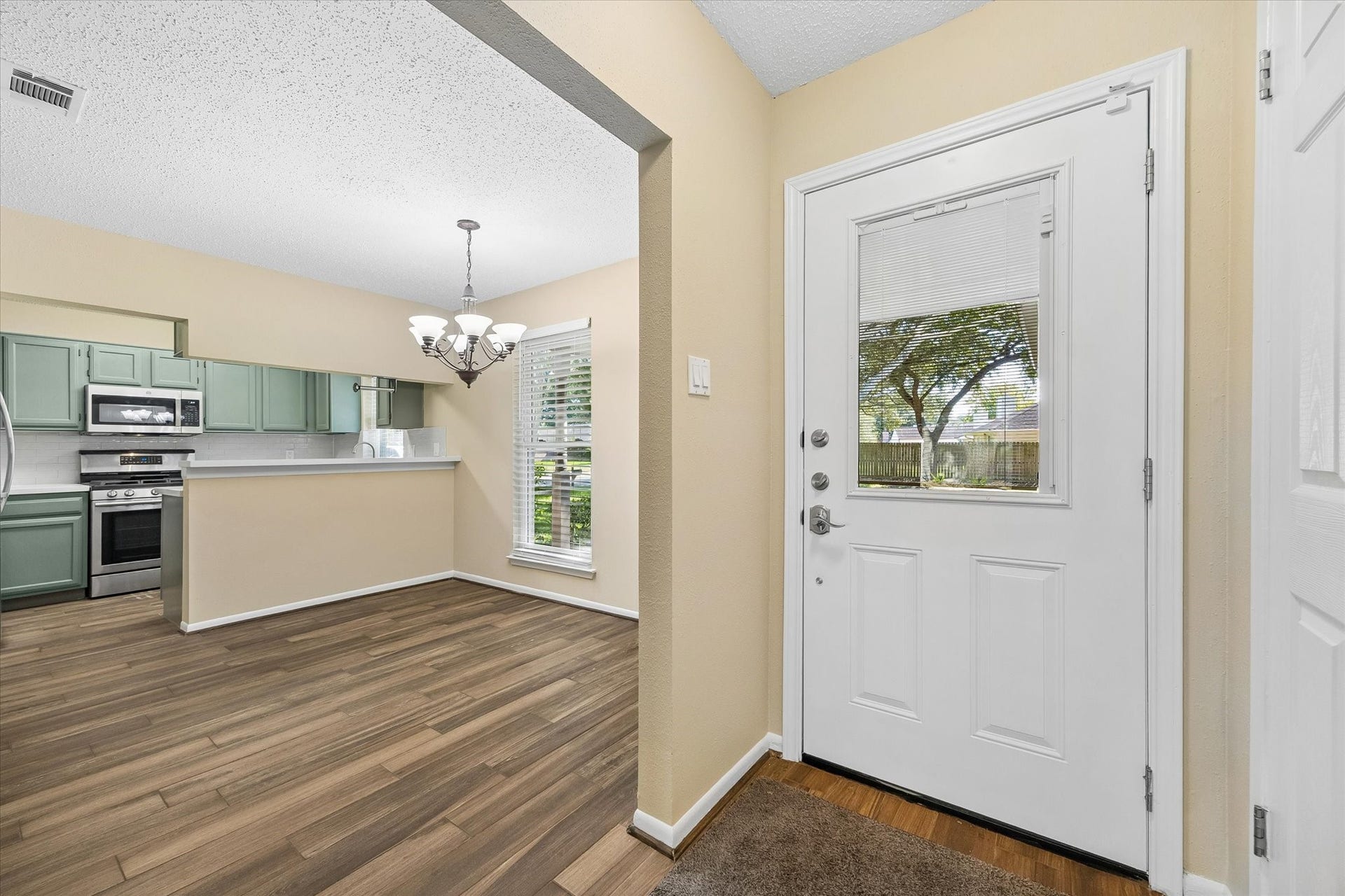 3911 Kitchen Hill Lane, Sugar Land, TX 77479 Step inside to an inviting layout where the dining area and updated kitchen connect beautifully, creating a comfortable space for everyday living.