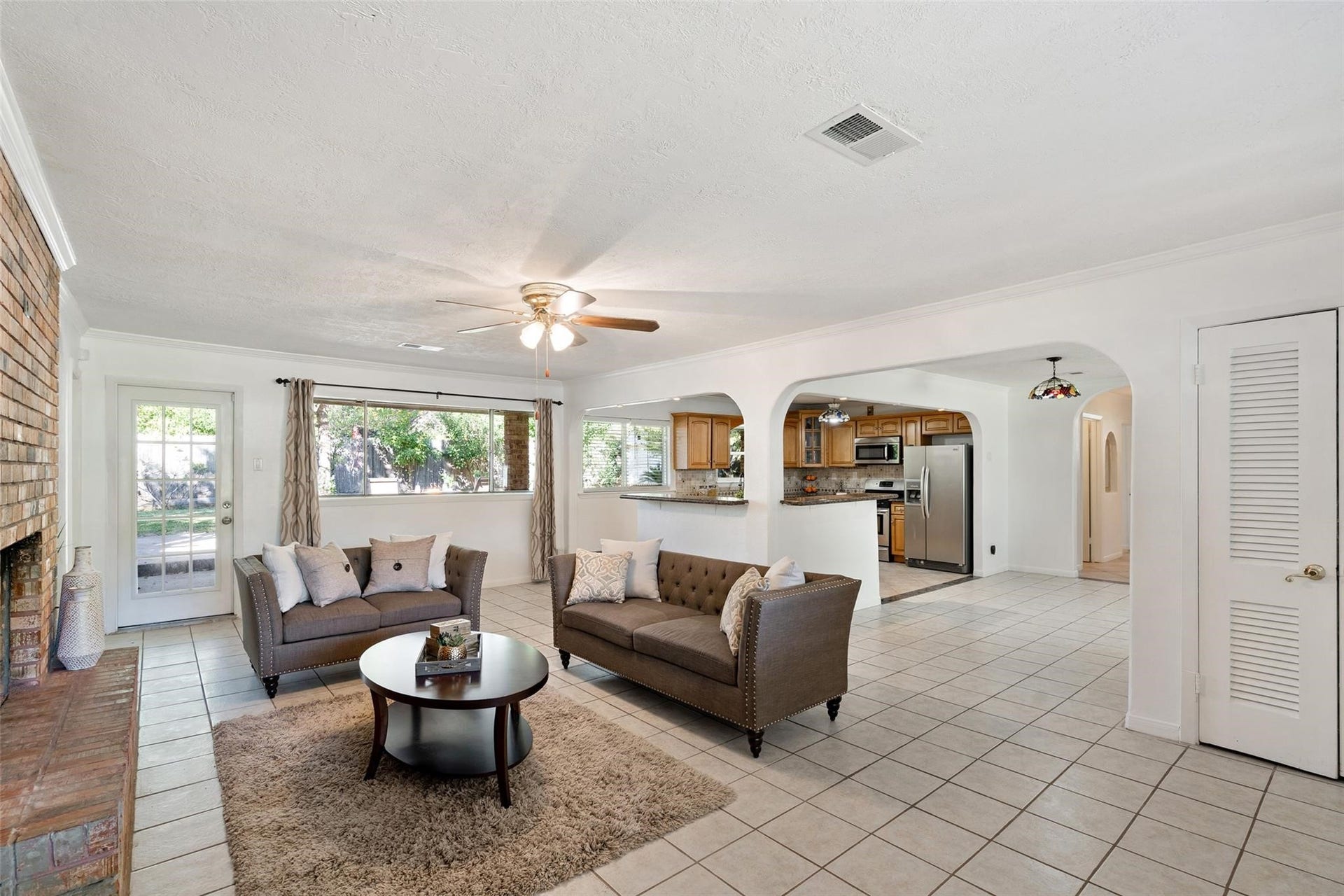Gorgeous Mid-Century Modern Ranch home is ready for YOU! Easy to maintain tile floor flows throughout all the main living spaces. Beautiful open concept kitchen makes entertaining a breeze!*Home was previously furnished. There is currently no furniture in the home.