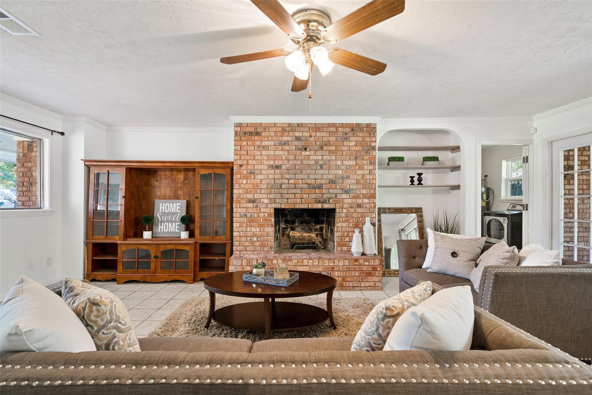 Imagine cozy nights gathered around the fireplace with multiple built in shelves and fresh neutral paint.*Home was previously furnished. There is currently no furniture in the home.