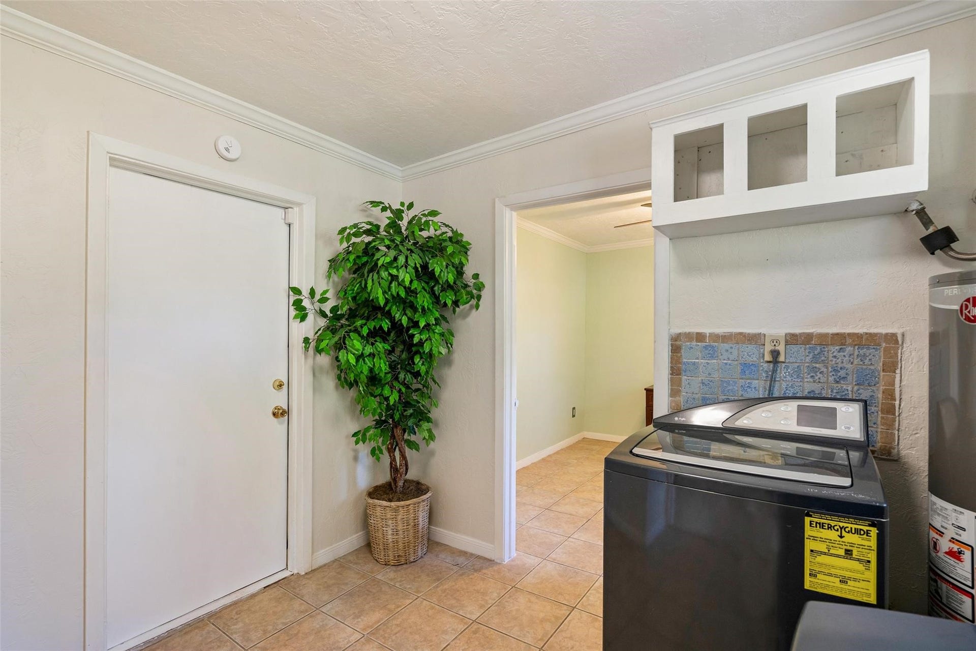 The utility room is conveniently located by the garage and flex room.*Home was previously furnished. There is currently no furniture in the home.