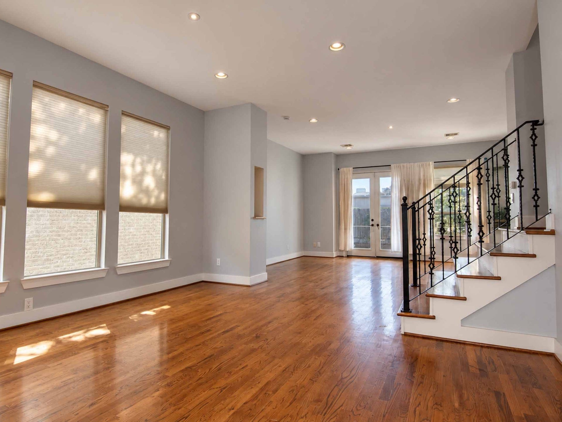 1716 Dunlavy Street, Houston, TX 77006 Open concept kitchen, dining and living room with a balcony.