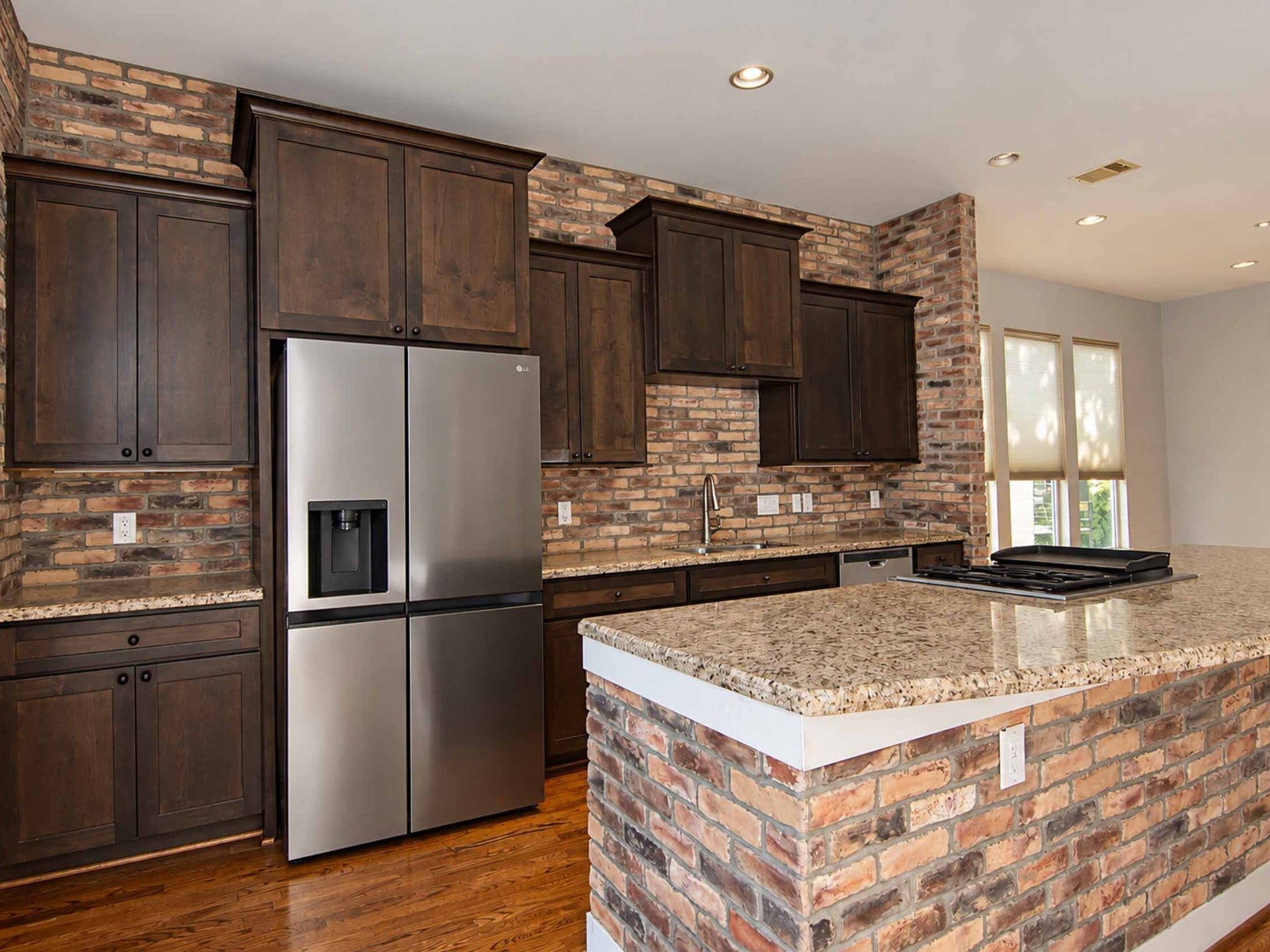1716 Dunlavy Street, Houston, TX 77006 Custom brick accents in the kitchen.