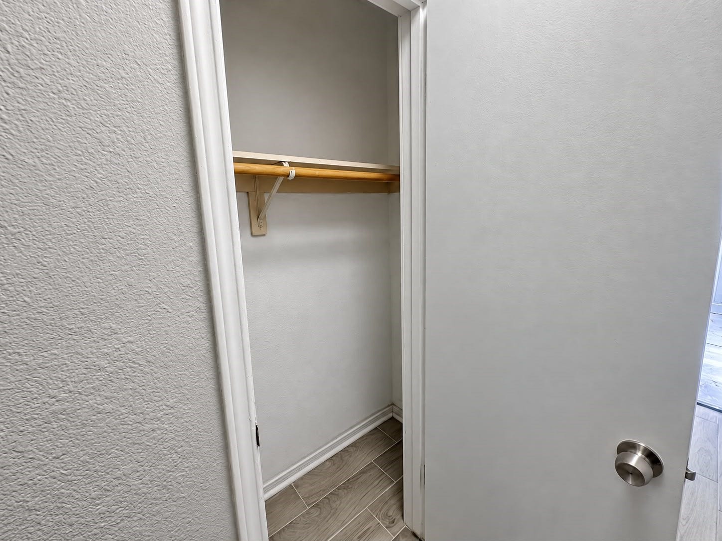 9711 Linkmeadow Lane, #12B, Houston, TX 77025 Closet with built-in shelf and hanging rod.