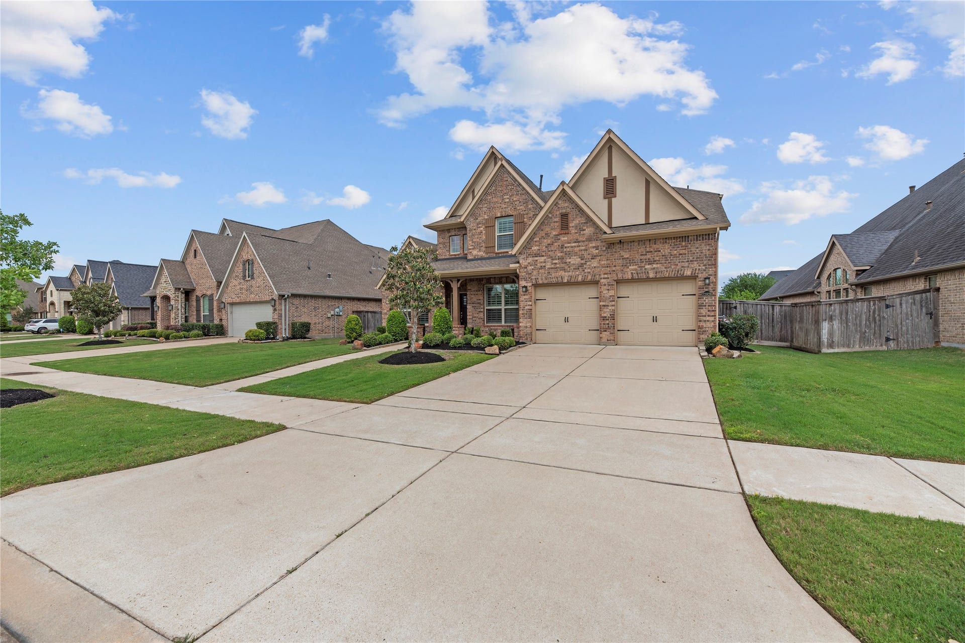 22826 Burton Grove Road, Richmond, TX 77469 This beautiful home offers a 3 car tandem garage.