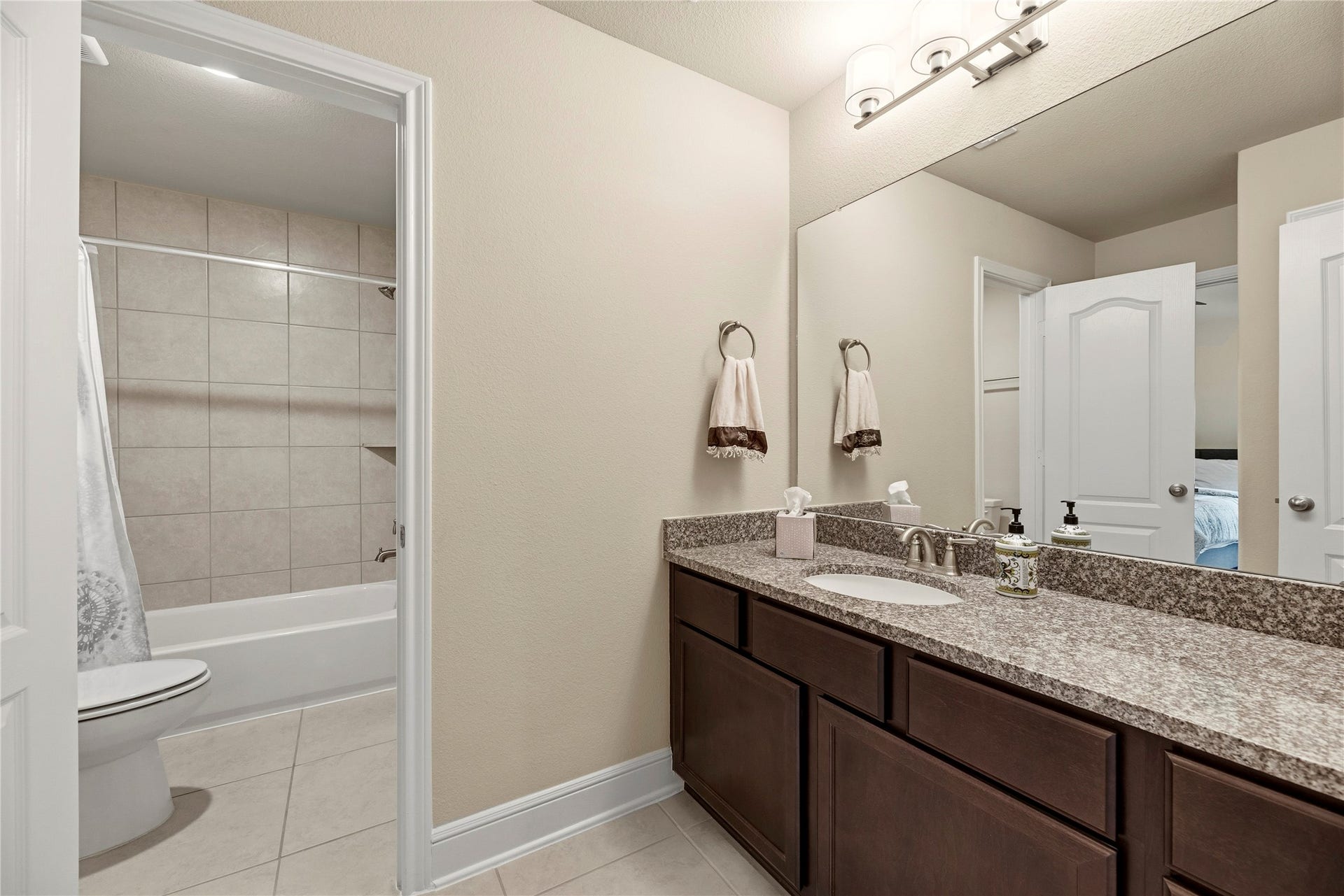 22826 Burton Grove Road, Richmond, TX 77469 The upstairs Jack & Jill bathroom is also accessible from the game and media rooms.