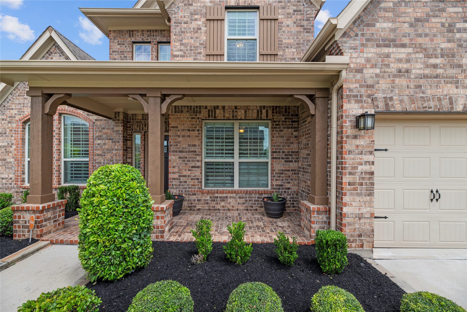 22826 Burton Grove Road, Richmond, TX 77469 The front porch adds a touch of southern charm.