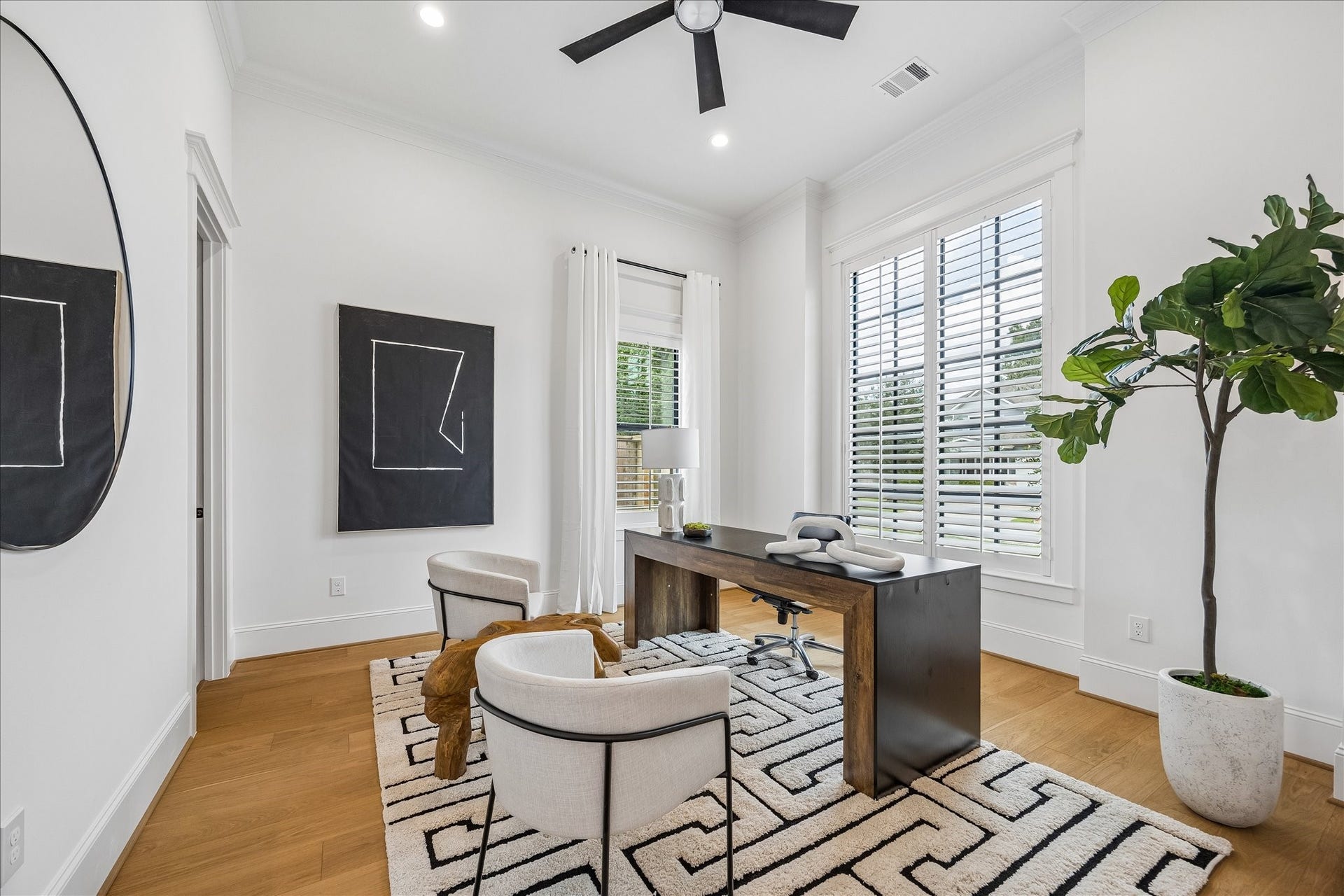 Positioned just off the foyer, the first floor study features tall ceilings, wide plank hardwood floors and oversized windows for abundant natural light. With a private ensuite bath and closet, the space can also serve as a fifth bedroom or guest suite.