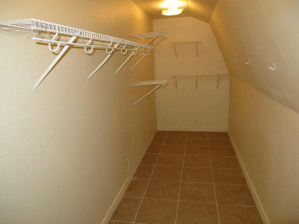 2492 Southline Road, Conroe, TX 77384 Large closet at top of stairs