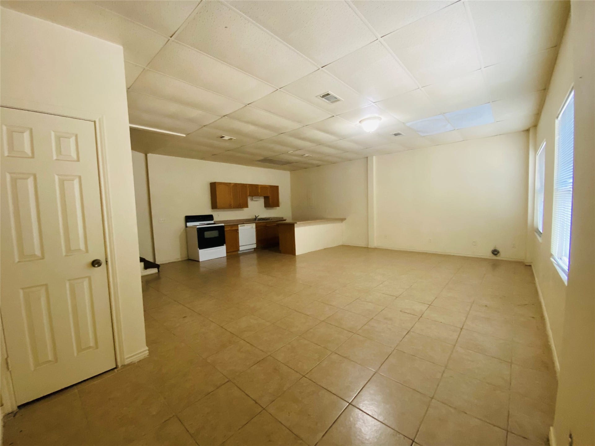 2492 Southline Road, Conroe, TX 77384 Entry with closet, Living, Dining & Kitchen