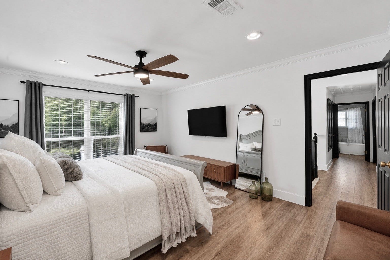 129 N Rainbow Ridge Circle, The Woodlands, TX 77381 Thoughtfully positioned to feel tucked away while still connected to the home