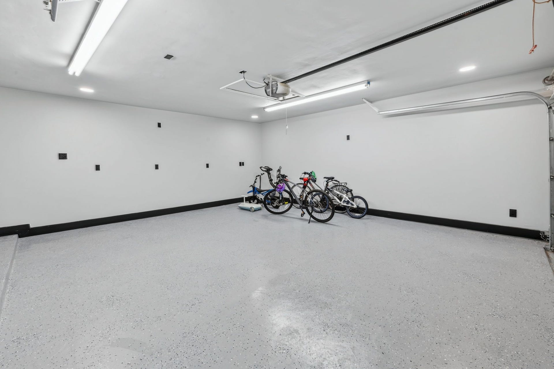 129 N Rainbow Ridge Circle, The Woodlands, TX 77381 Even the garage was elevated, finished with epoxy floors and upgraded lighting