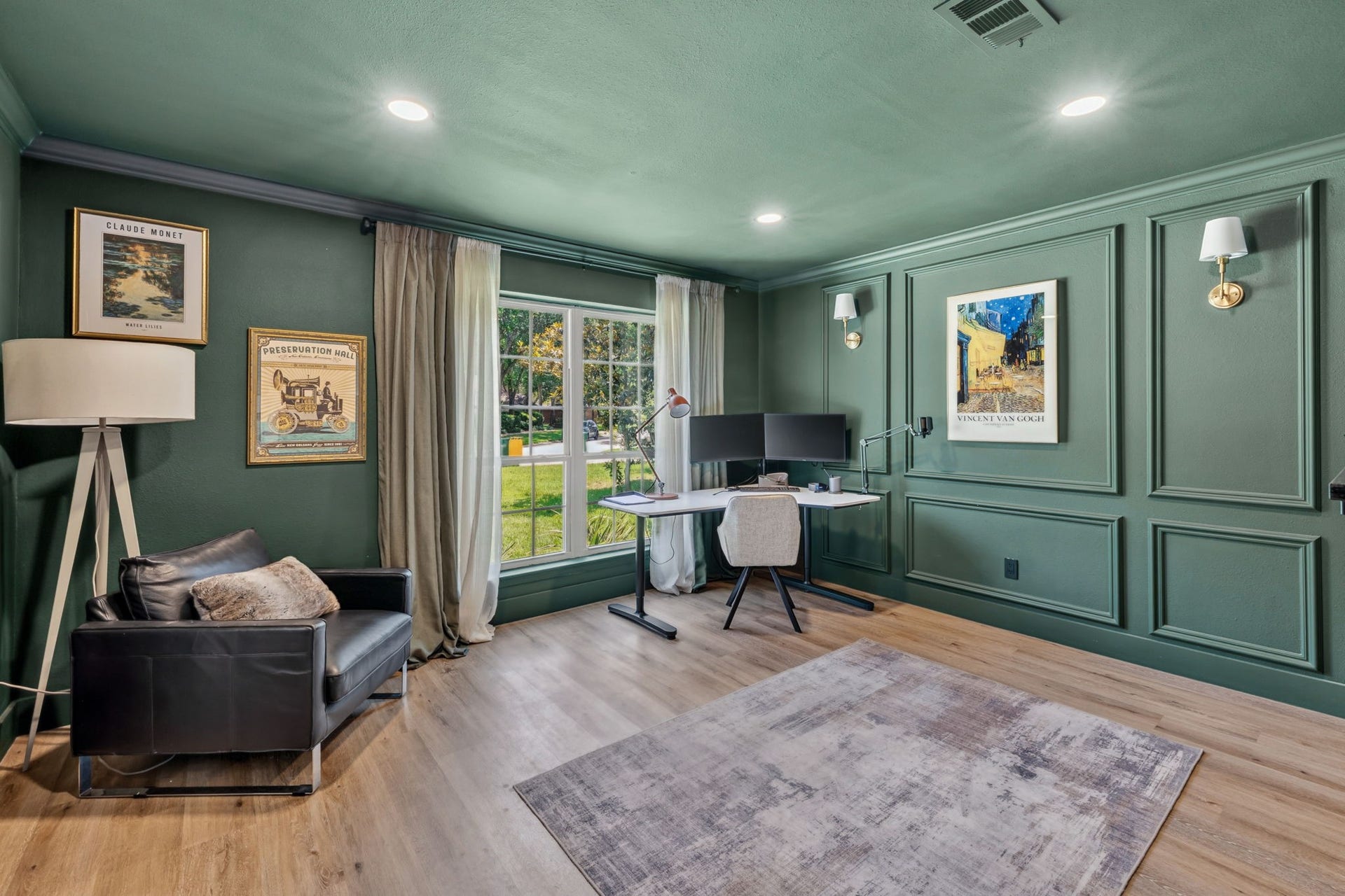129 N Rainbow Ridge Circle, The Woodlands, TX 77381 Natural light softens the rich tones and custom detailing throughout the office