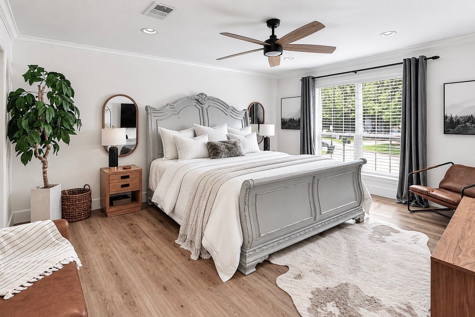 129 N Rainbow Ridge Circle, The Woodlands, TX 77381 A spacious primary retreat filled with soft light and peaceful views