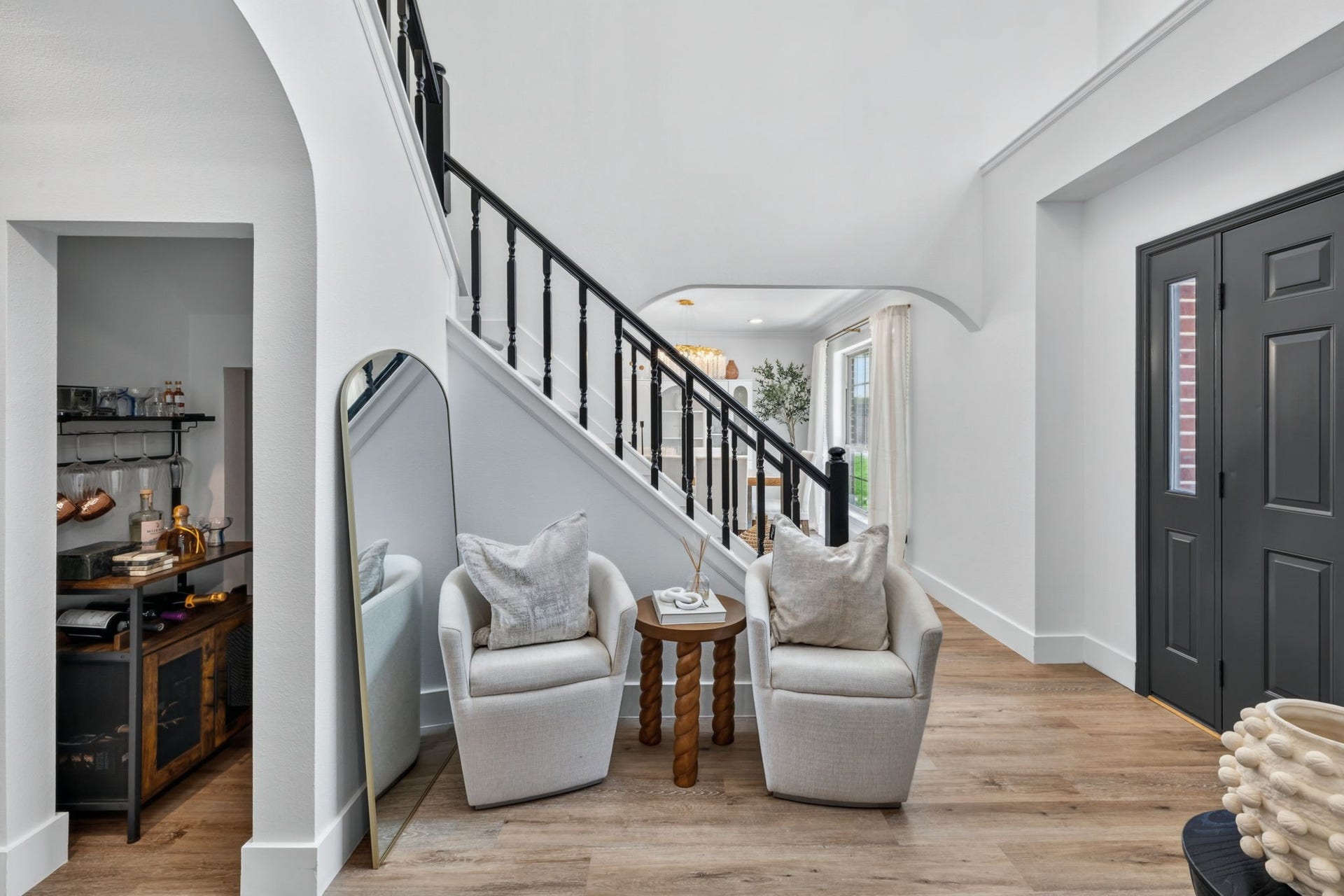 129 N Rainbow Ridge Circle, The Woodlands, TX 77381 Step inside to layered spaces designed for gathering, hosting, and slowing down