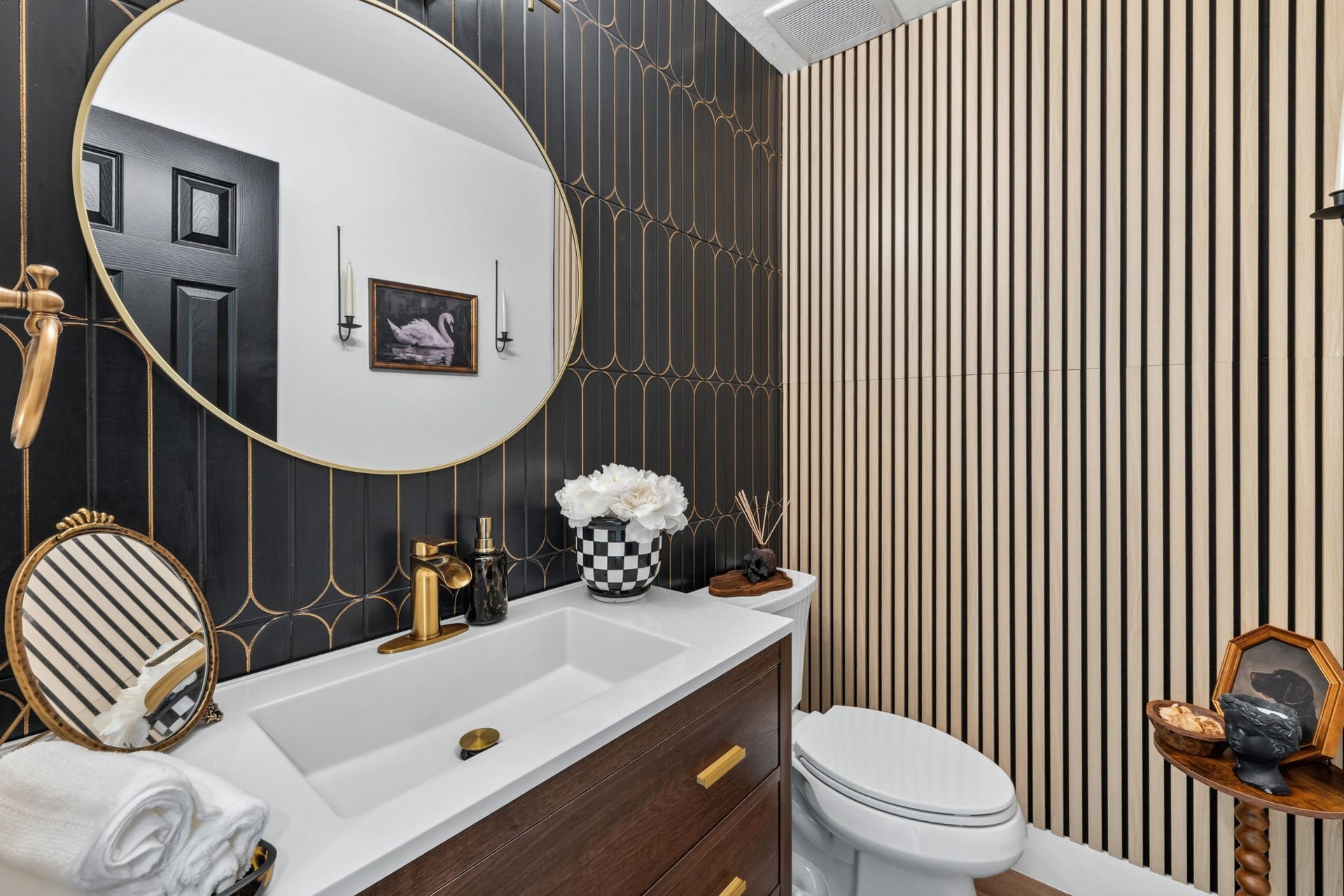 129 N Rainbow Ridge Circle, The Woodlands, TX 77381 Layered textures and paneling bring warmth to even the smallest spaces