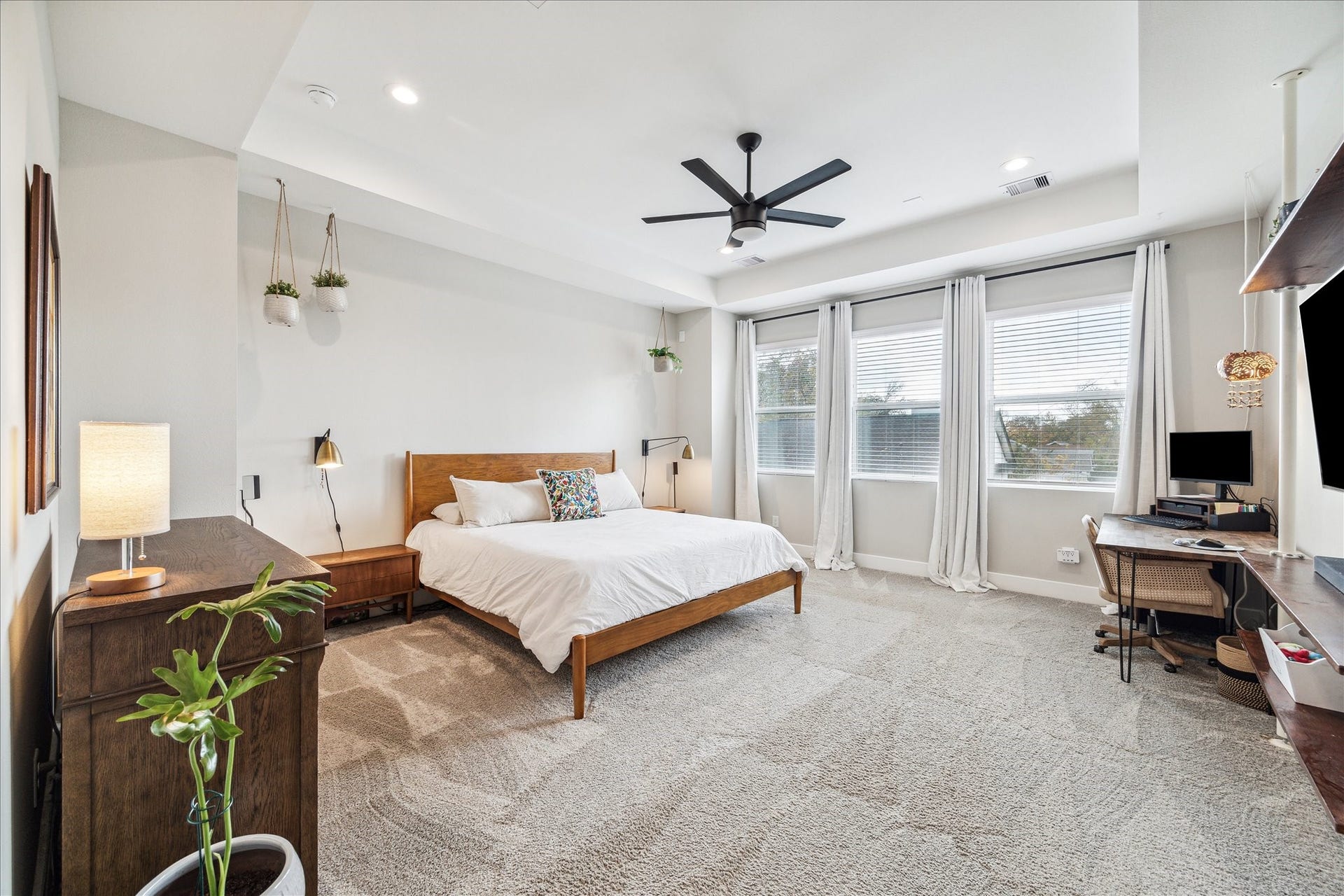 Large primary bedroom with downtown views.