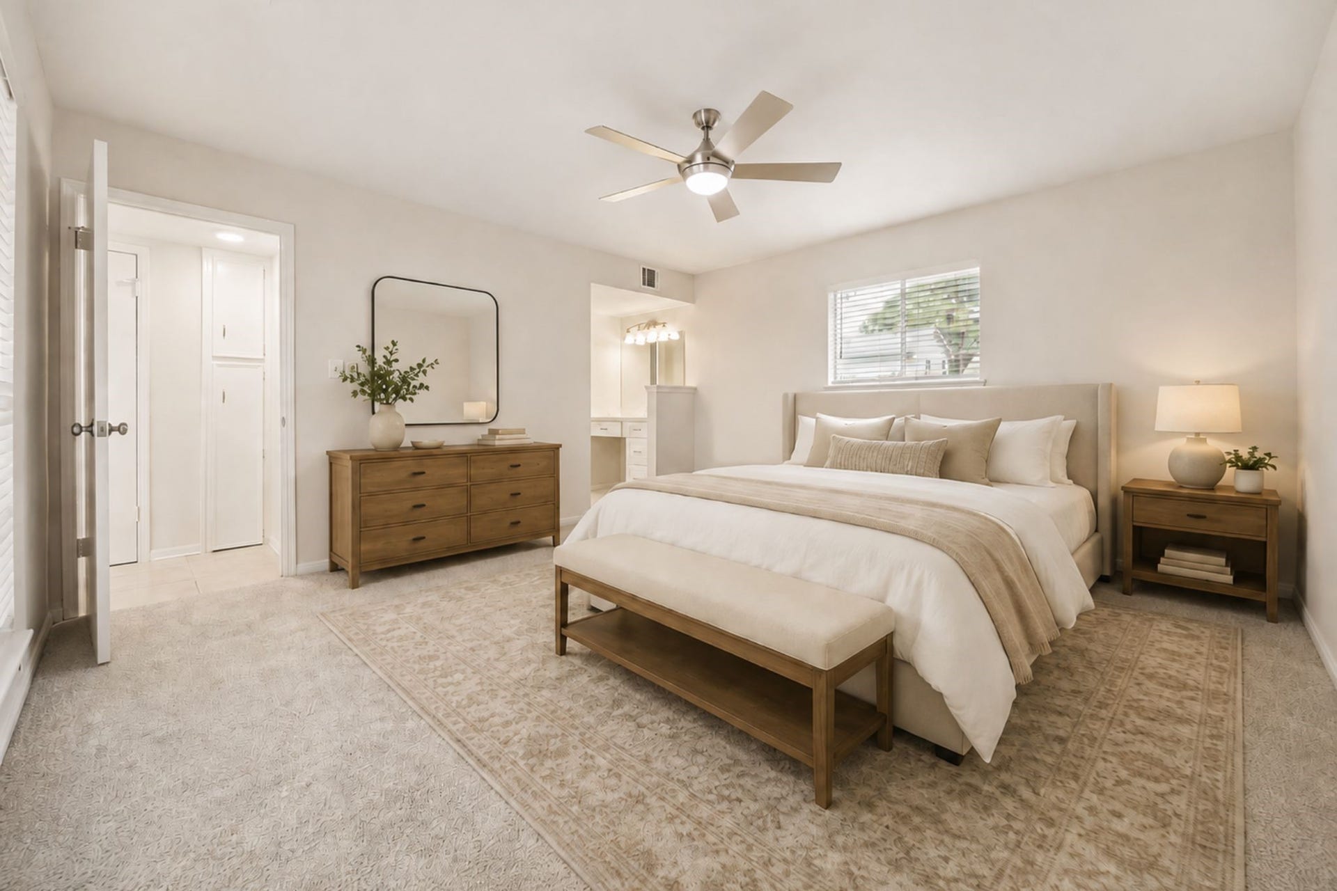 114 CAMELLIA STREET, Sugar Land, TX 77478 THE GENEROUS PRIMARY BEDROOM FEATURES A CEILING FAN, MULTIPLE WINDOWS, AND DIRECT ACCESS TO THE EN SUITE BATH. **Virtually Staged.