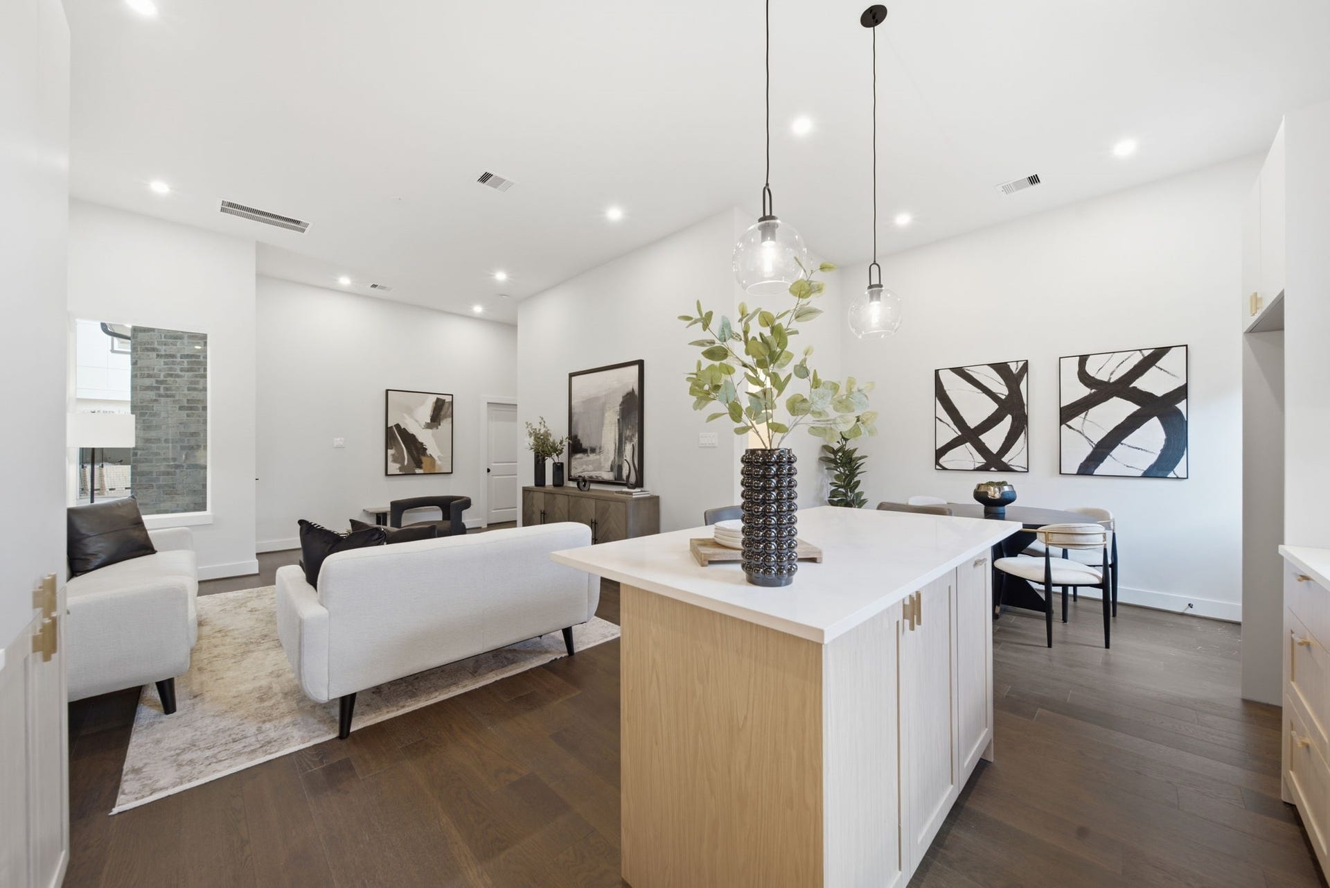 5522 Wheatley Street, #D, Houston, TX 77091 Kitchen with beautiful waterfall island, soft-close cabinetry & drawers.