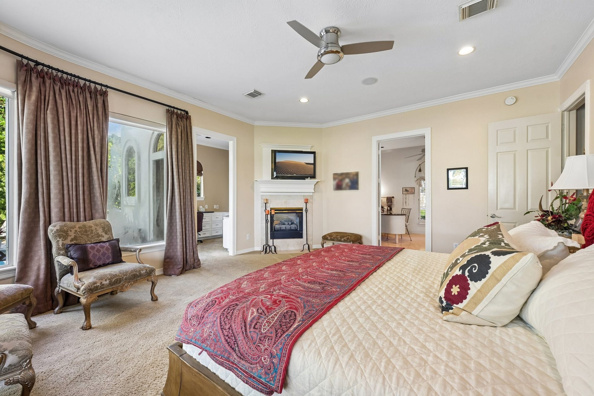 Generously proportioned primary suite featuring a dedicated sitting area