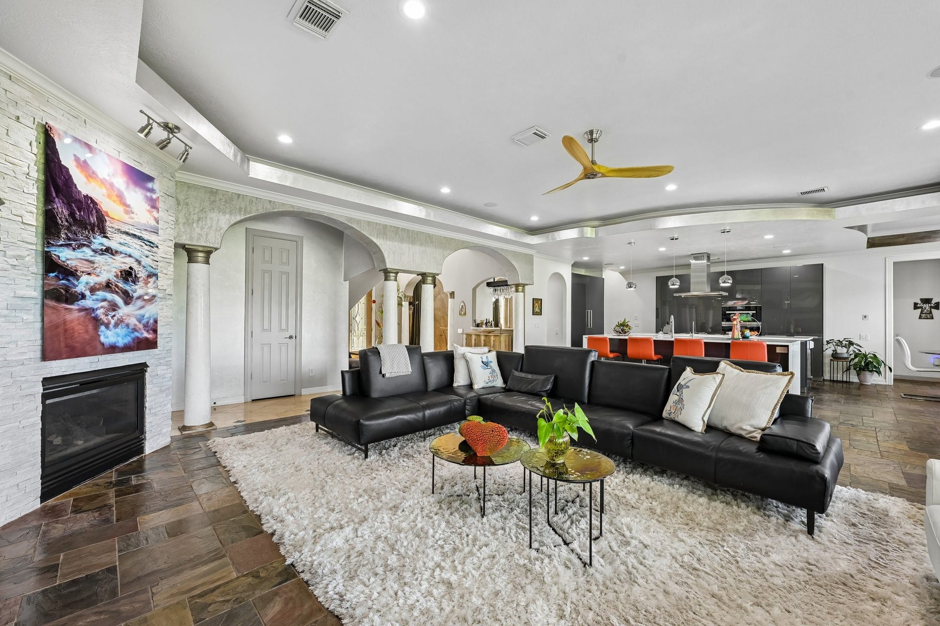 Inviting gathering space with generous seating and an open flow into the adjoining kitchen, ideal for entertaining