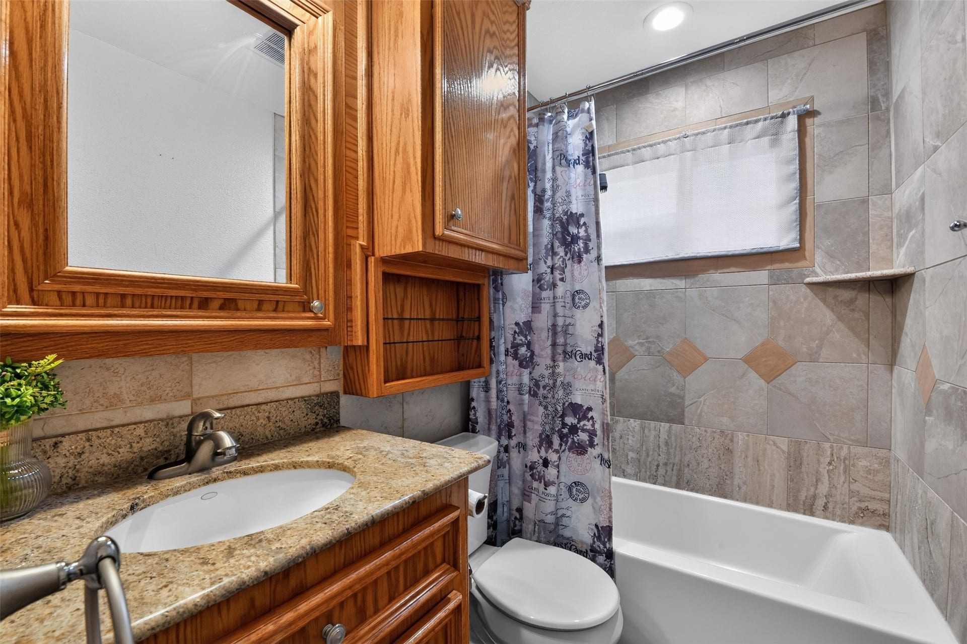 1918 Oaklawn Street, Sugar Land, TX 77498 Second full bath has tub/shower and updated counters and fixtures.