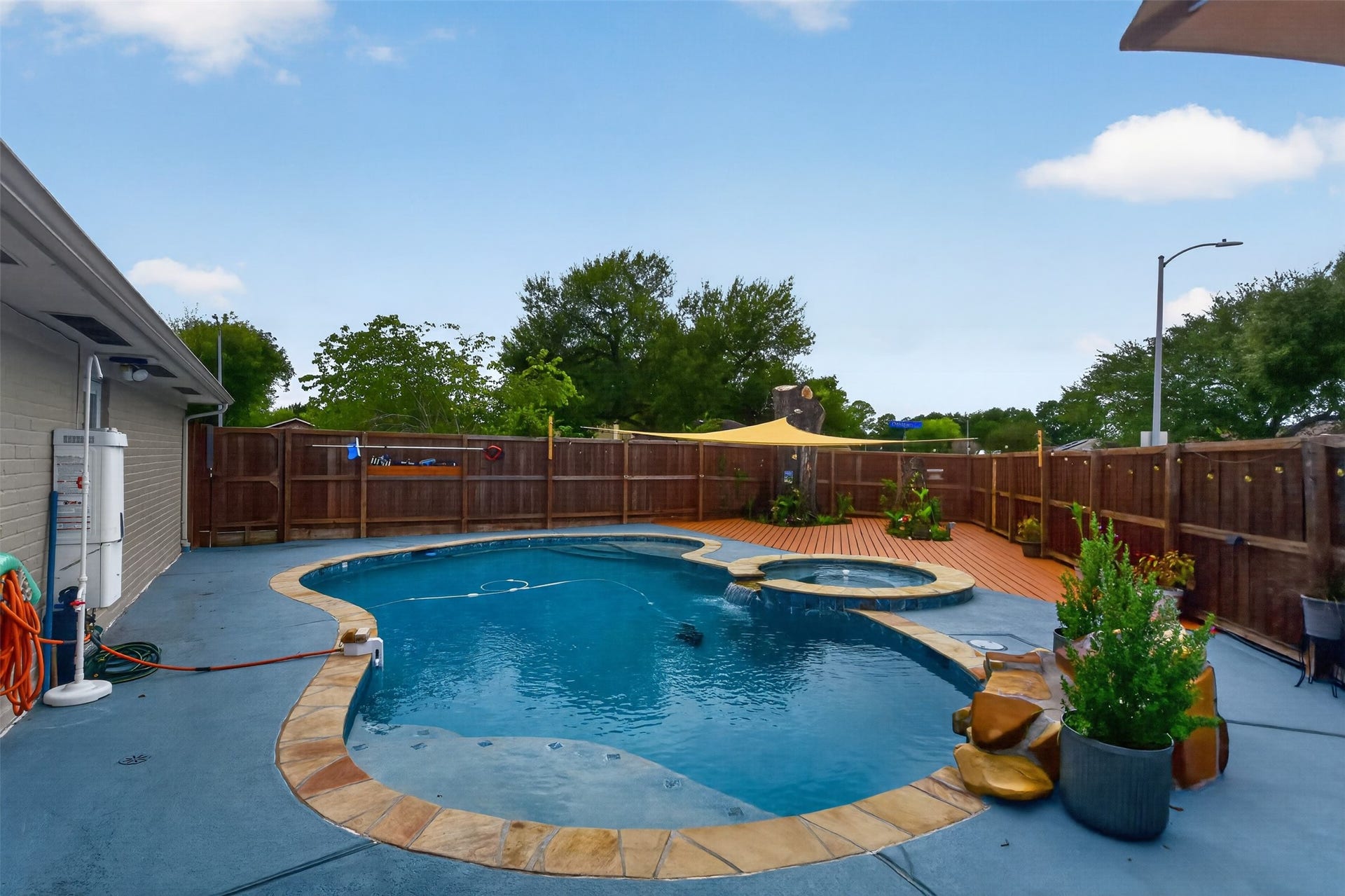 1918 Oaklawn Street, Sugar Land, TX 77498 Pool is heated and has a hot tub. Enjoy making memories here with friends and family year round.