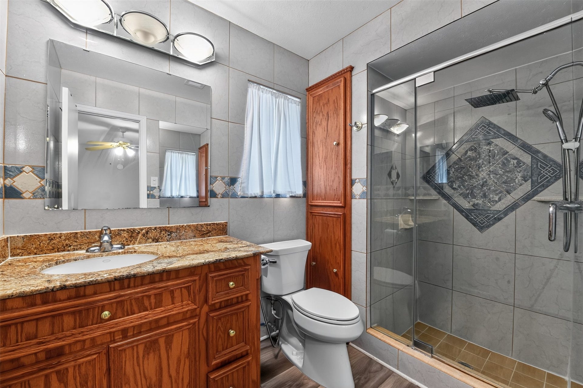 1918 Oaklawn Street, Sugar Land, TX 77498 Primary bathroom has been remodeled and updated with walk in shower.