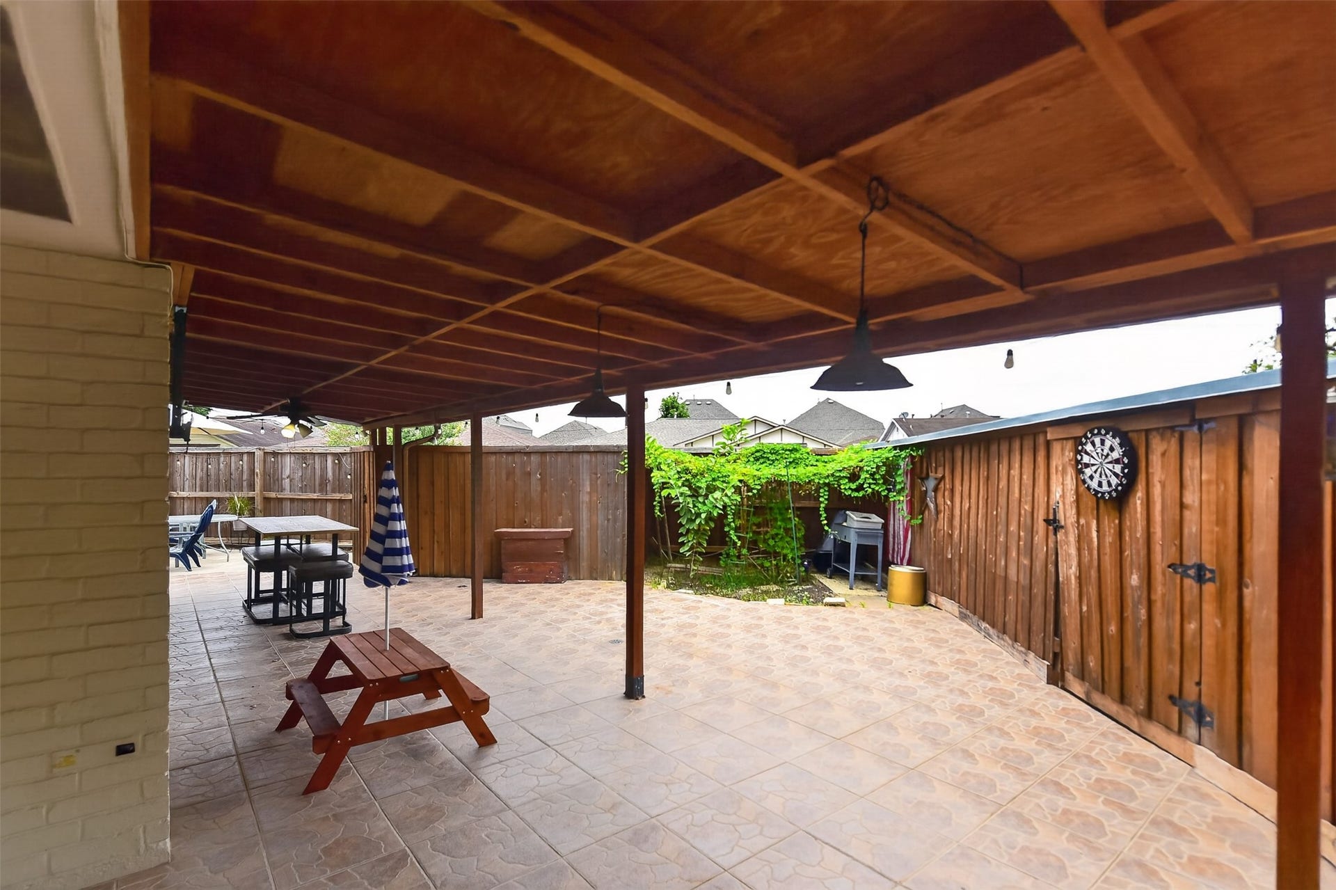 1918 Oaklawn Street, Sugar Land, TX 77498 Patio has room for numerous seating and eating areas plus a garden.