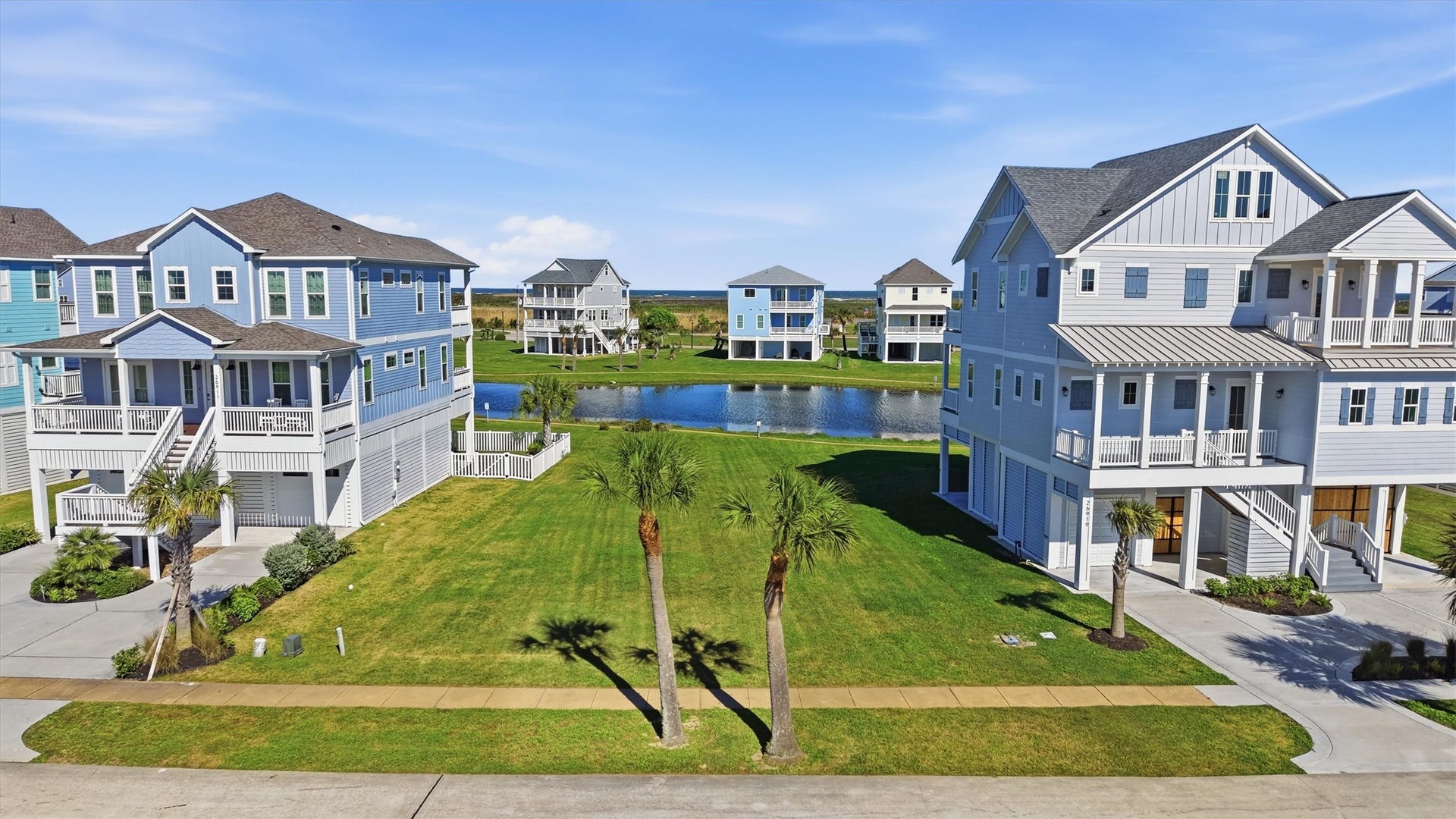 This spacious homesite offers a wonderful opportunity to build a custom coastal home with a relaxed sense of space between neighboring properties.