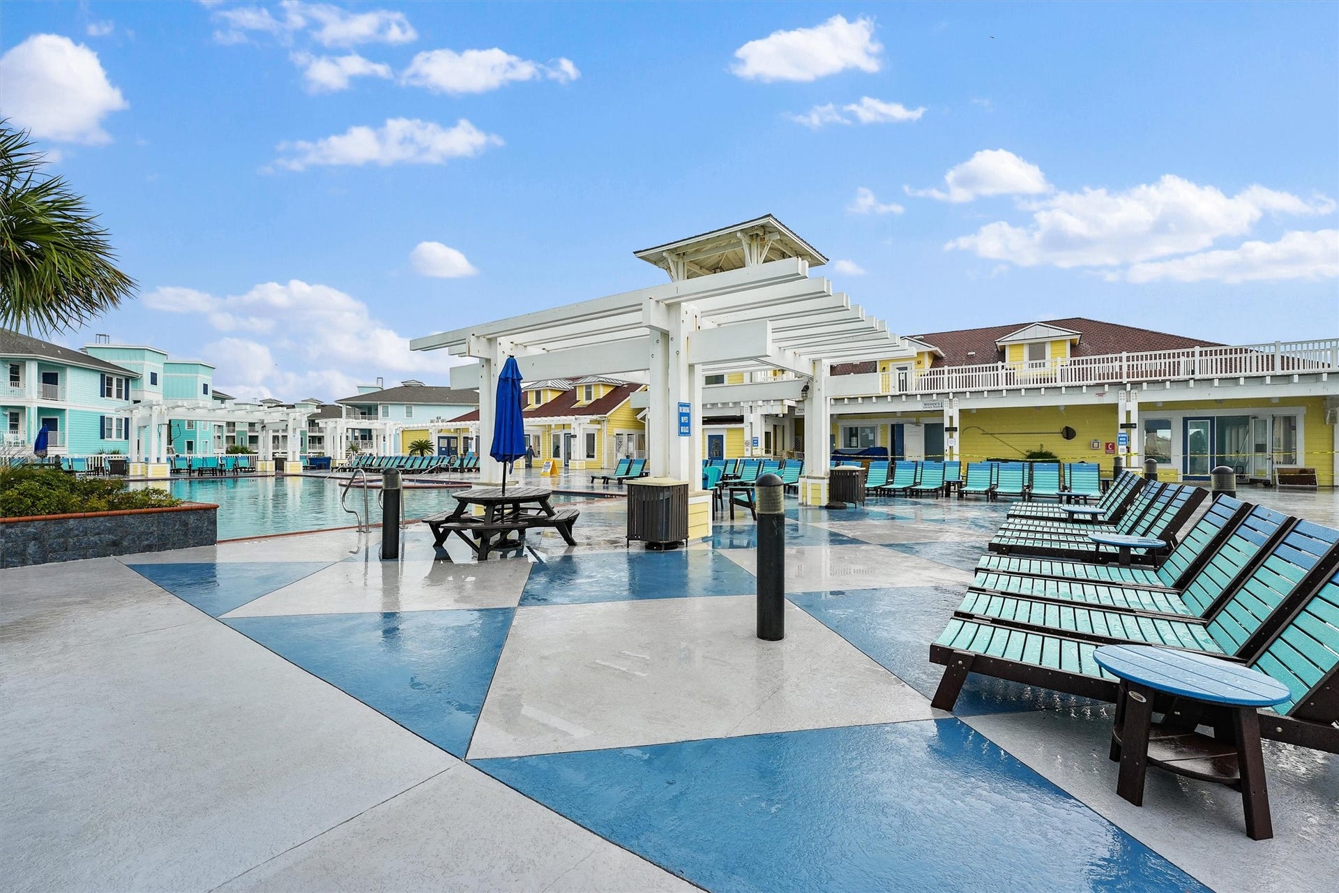 Another view of the community
pool highlights its spacious
design with plenty of lounge
seating for all-day relaxation.