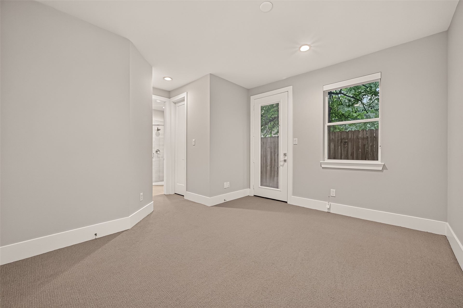 838 Fisher Street, #A, Houston, TX 77018 !st floor bedroom with access to fenced backyard space with low maintenance turf